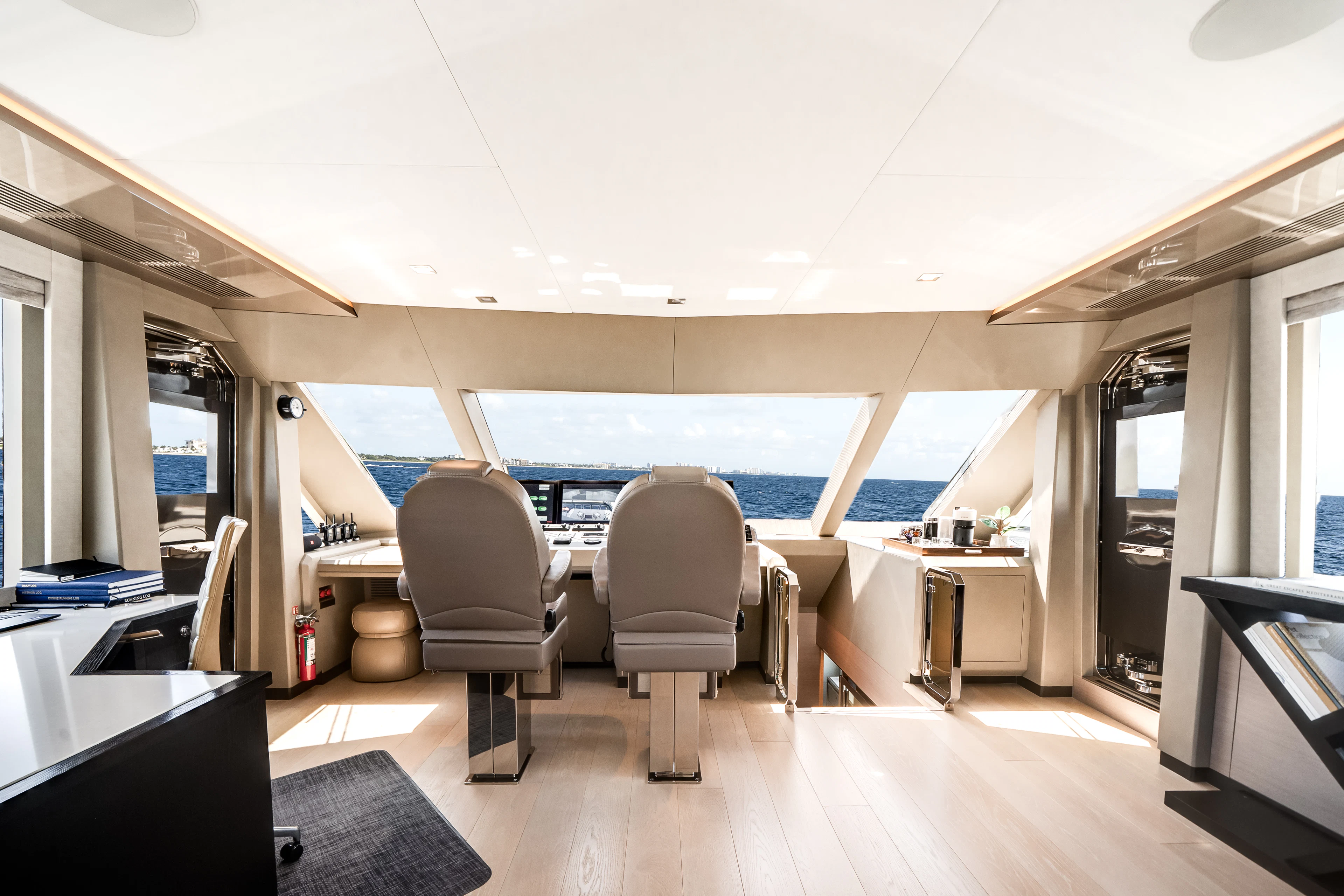 a room with a large pool table and chairs aboard JUST A VACATION Yacht for Sale