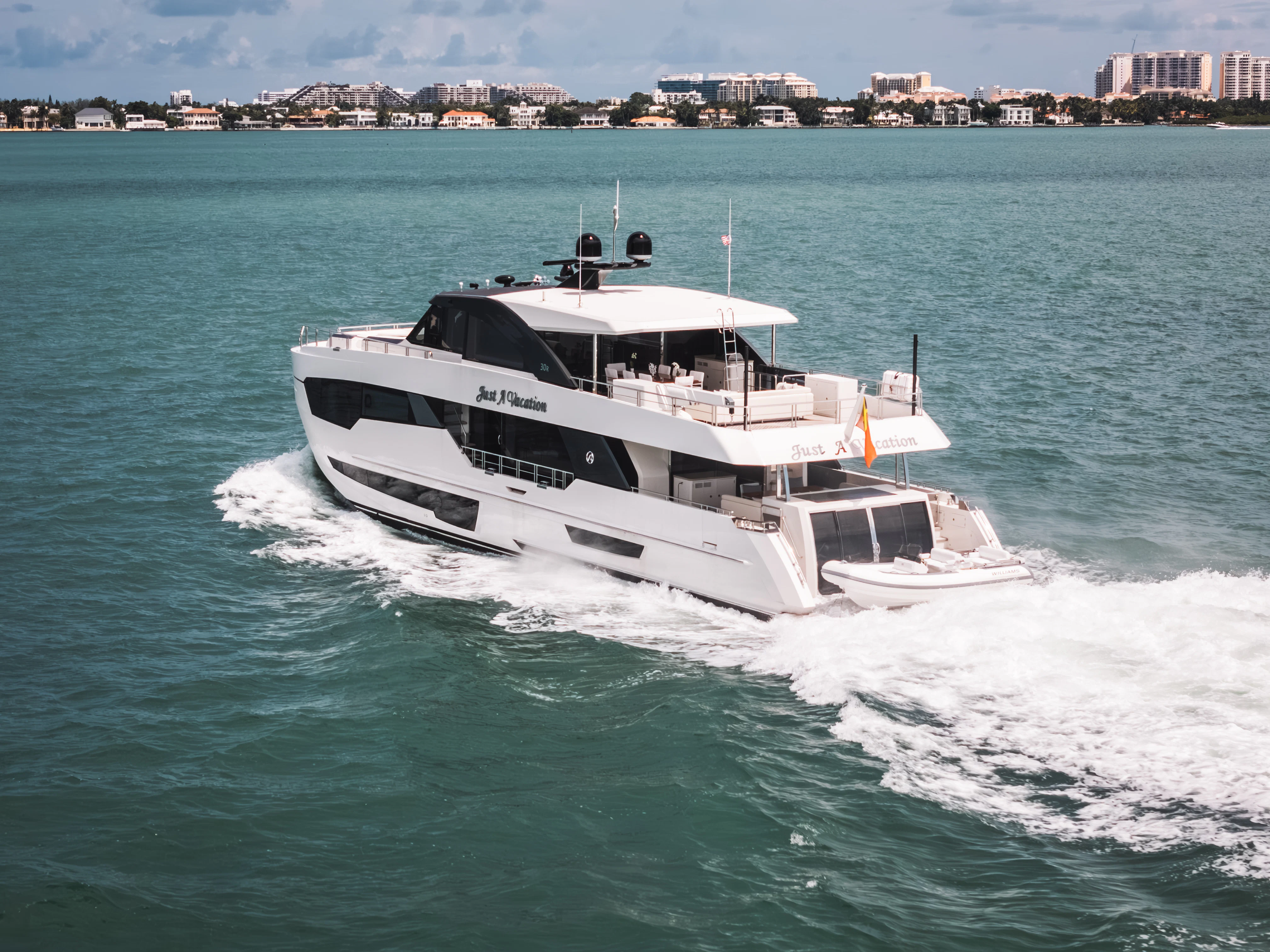a boat on the water aboard JUST A VACATION Yacht for Sale