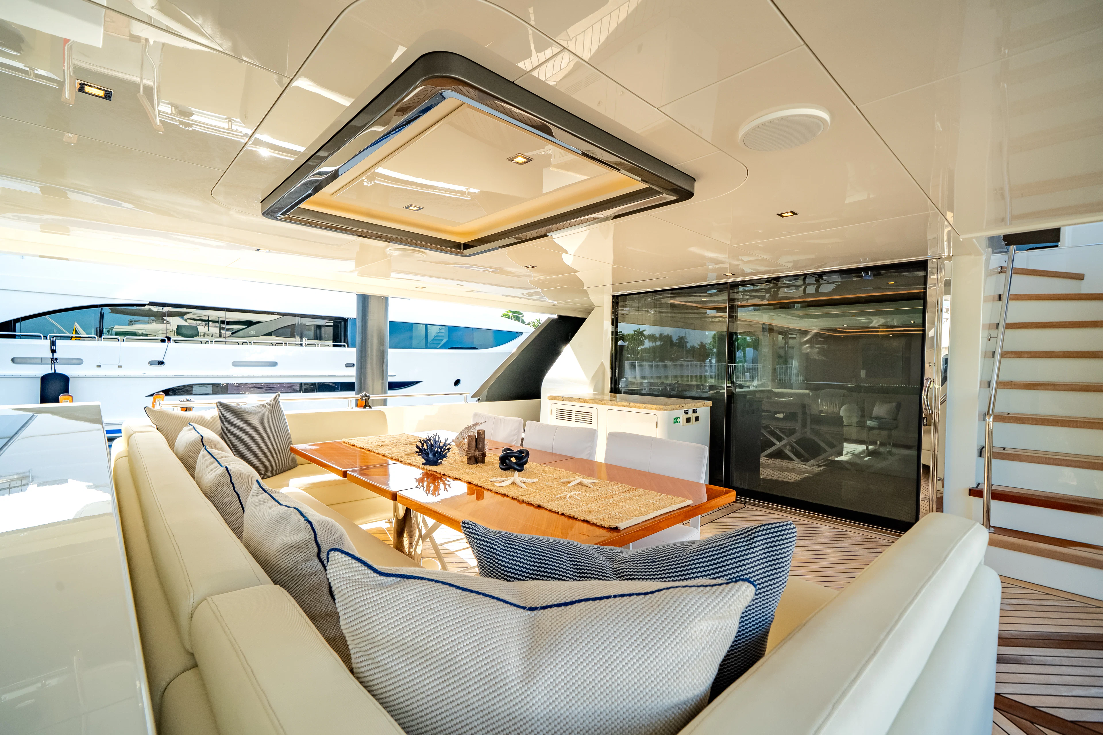 a room with a table and chairs aboard JUST A VACATION Yacht for Sale