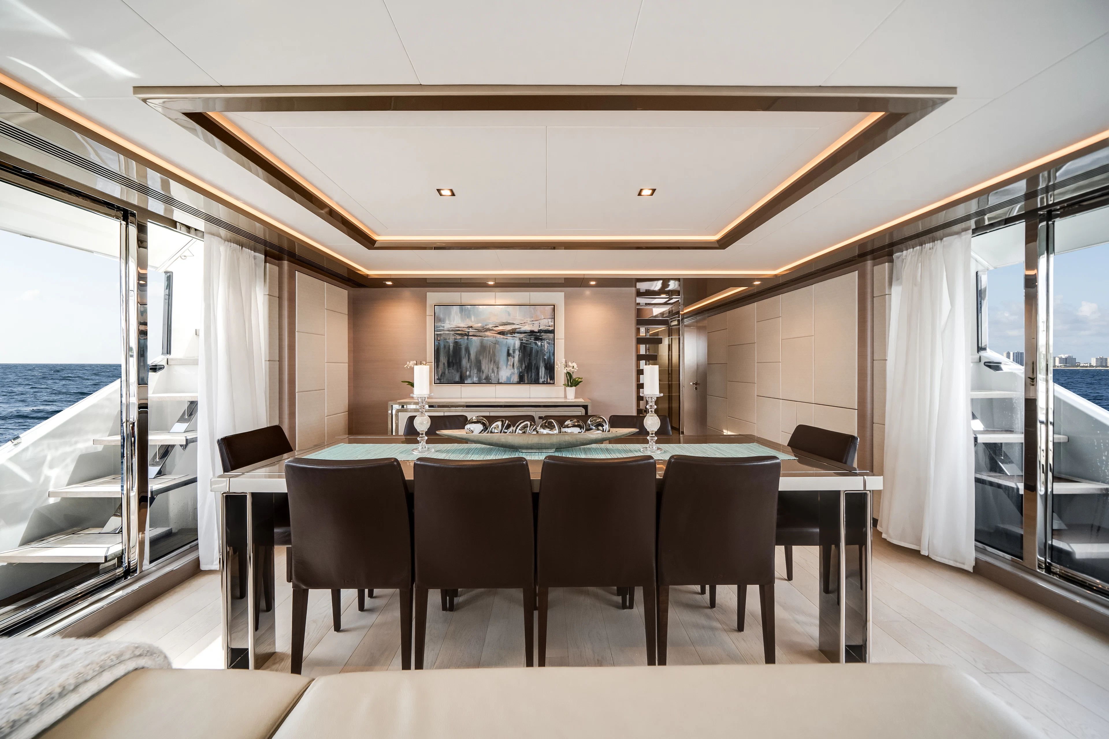 a large dining table in a room aboard JUST A VACATION Yacht for Sale