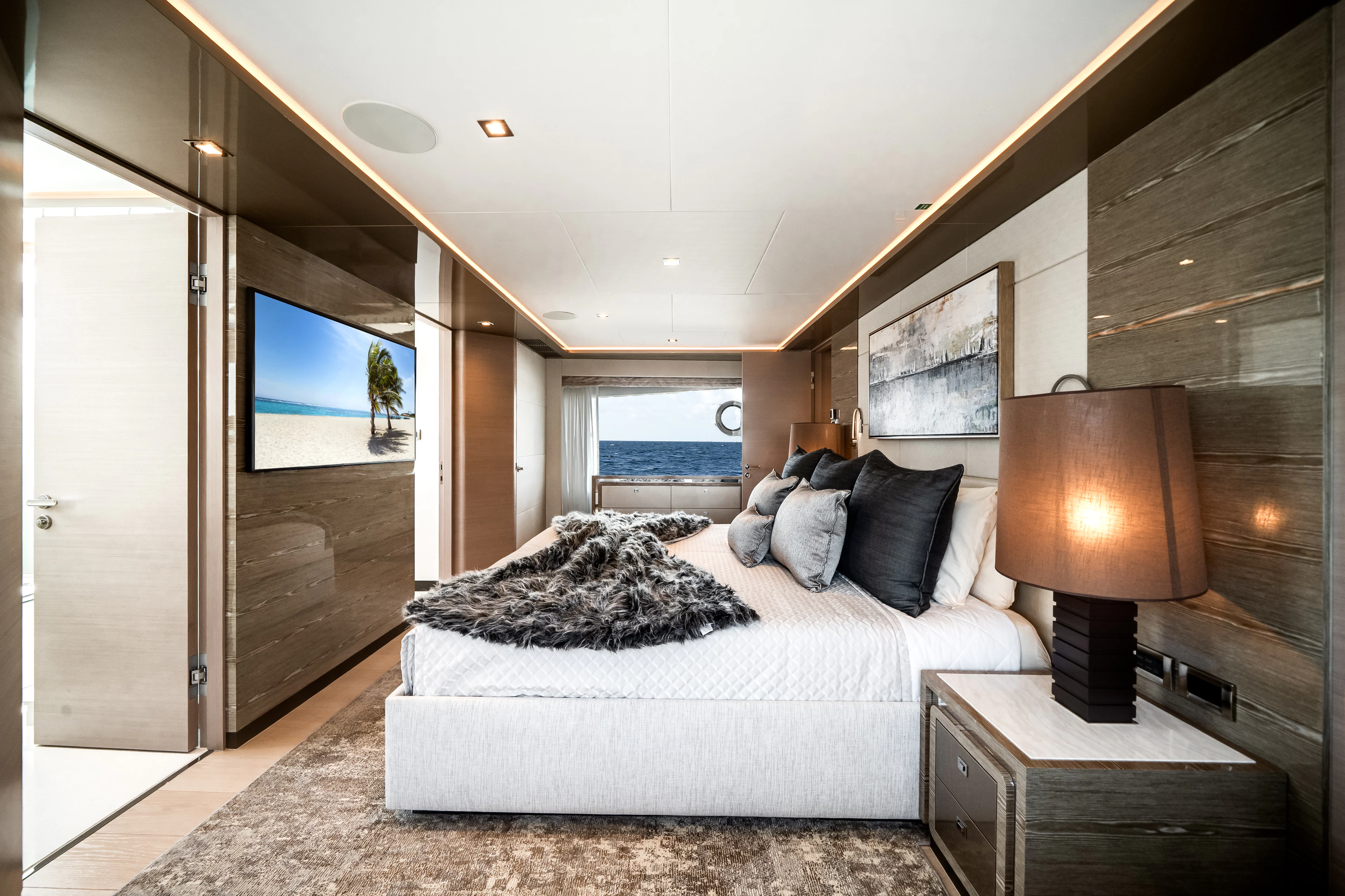 a large bedroom with a large bed aboard JUST A VACATION Yacht for Sale