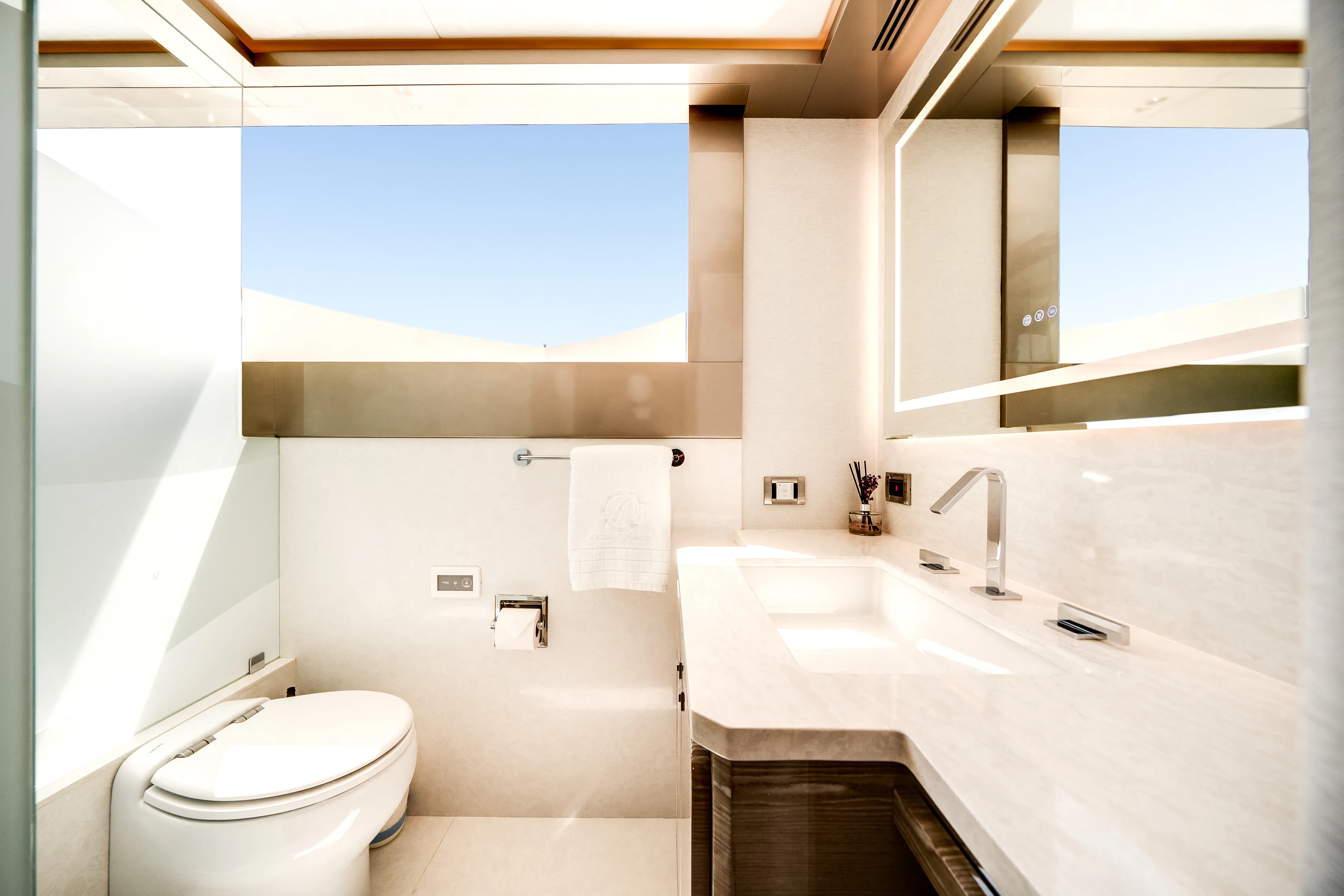 a bathroom with a large window aboard JUST A VACATION Yacht for Sale