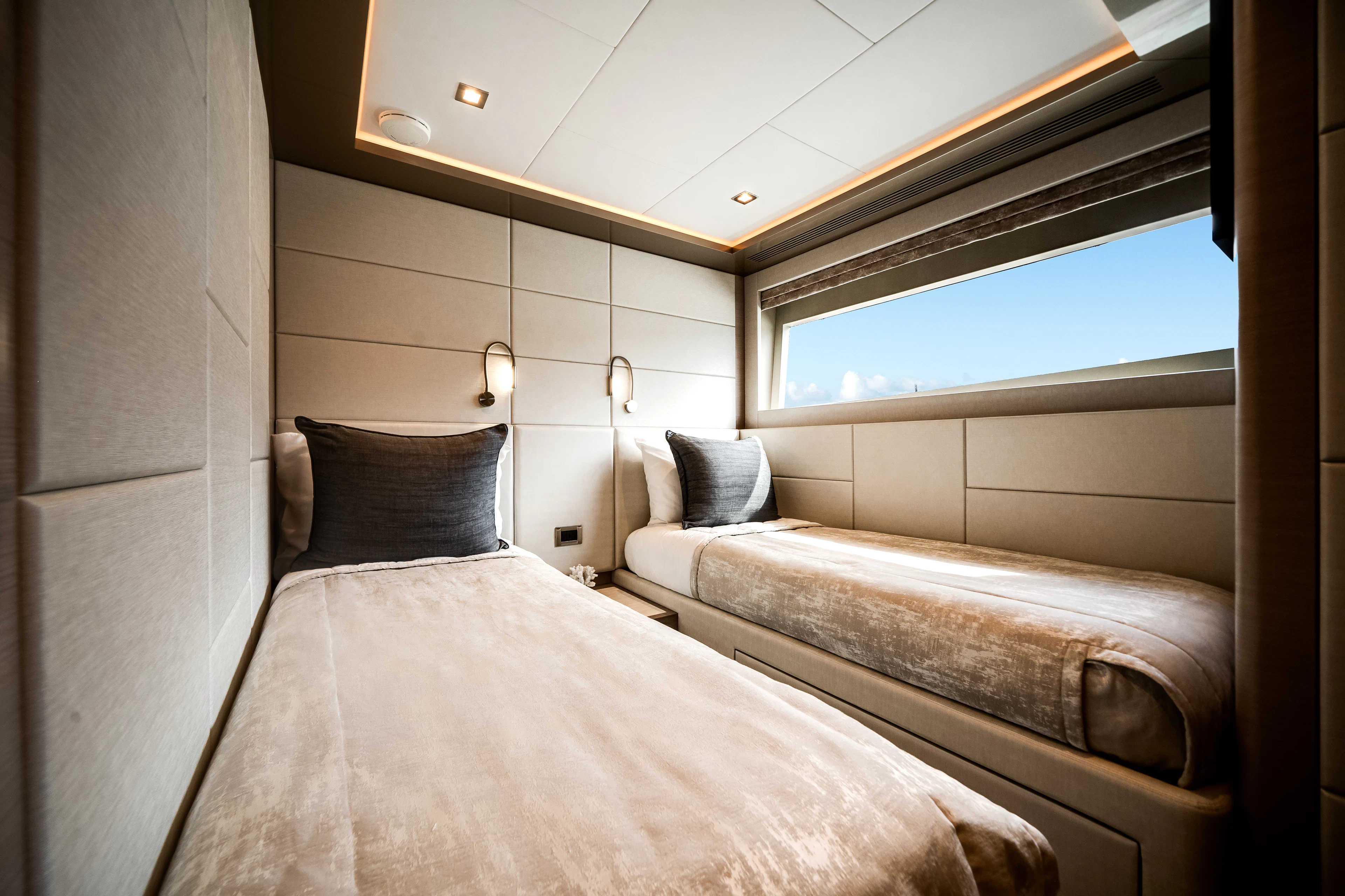 a room with two beds aboard JUST A VACATION Yacht for Sale