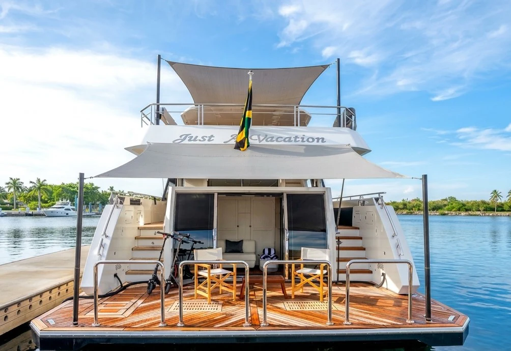 a boat on a body of water aboard JUST A VACATION Yacht for Sale