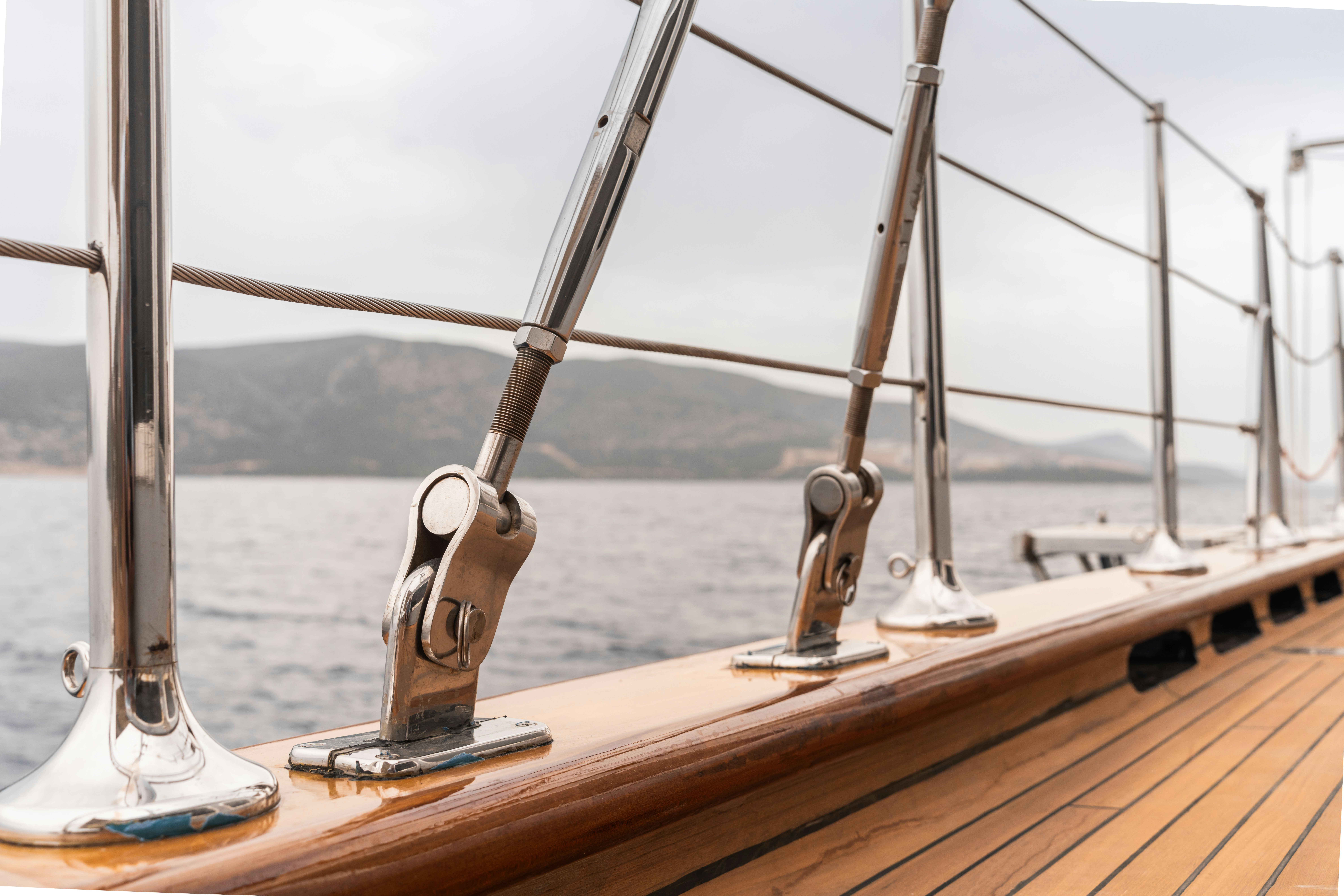 a glass and wood boat on a wooden deck aboard LE PIETRE Yacht for Sale