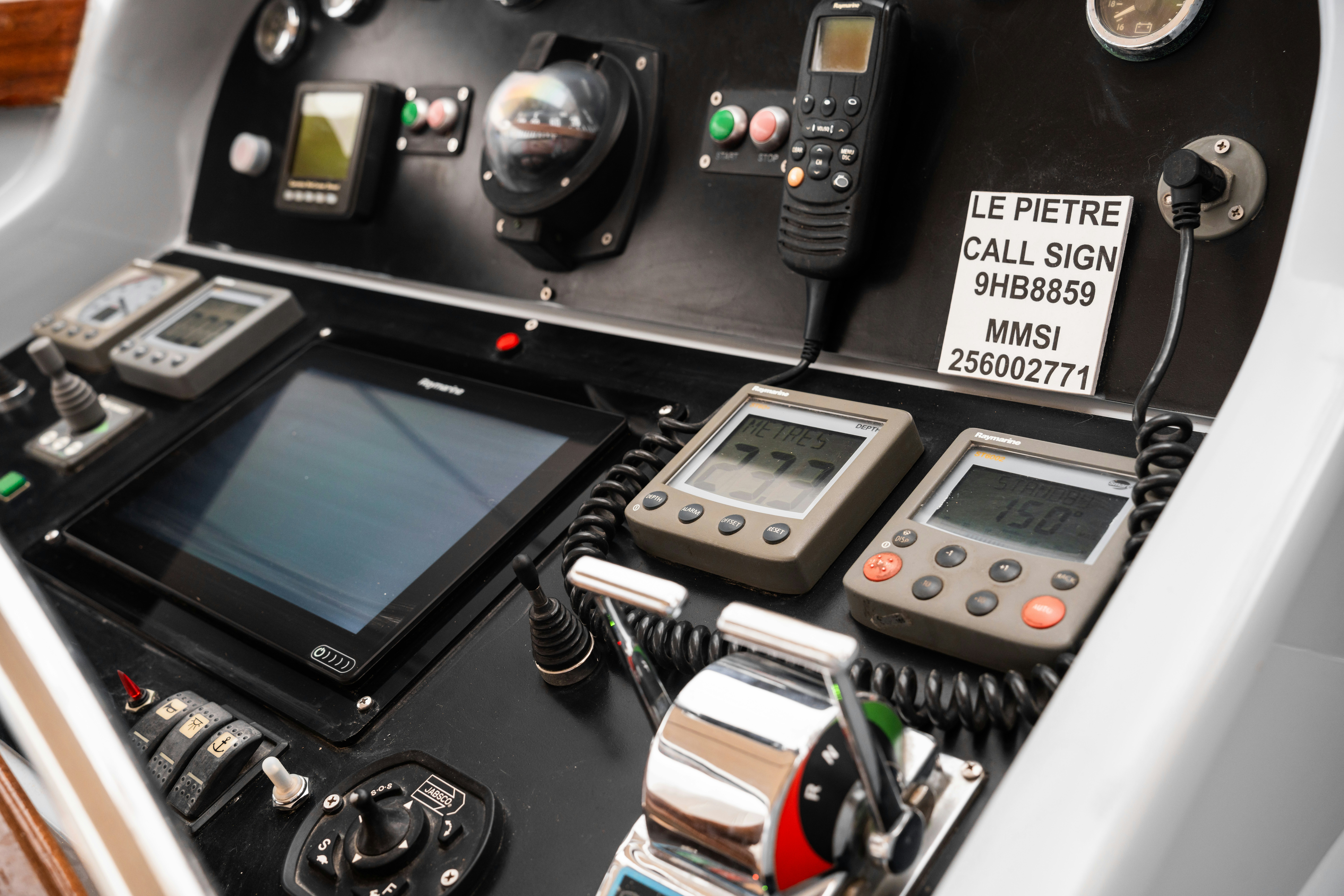a car console with a console and other electronics aboard LE PIETRE Yacht for Sale