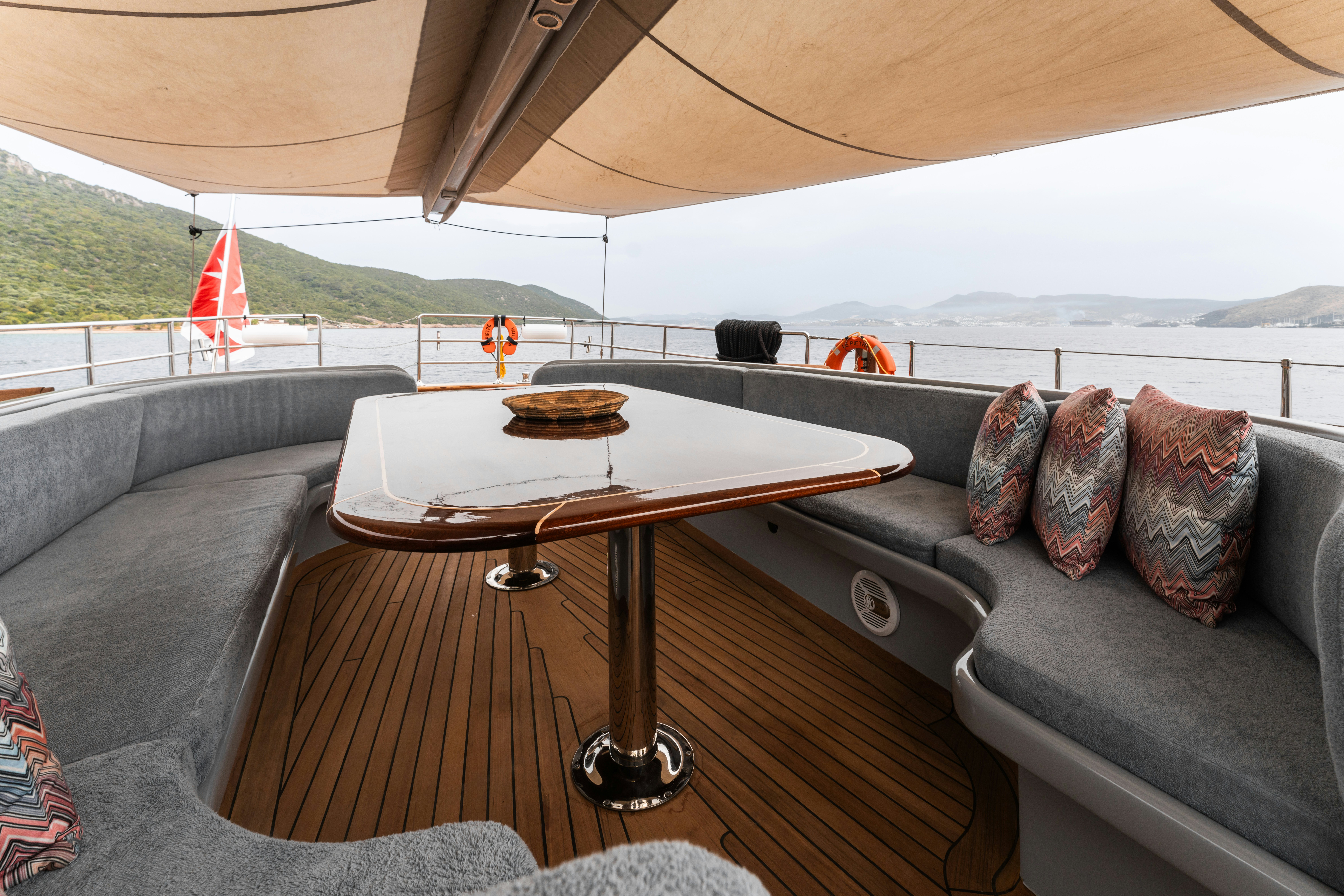 a table on a couch aboard LE PIETRE Yacht for Sale