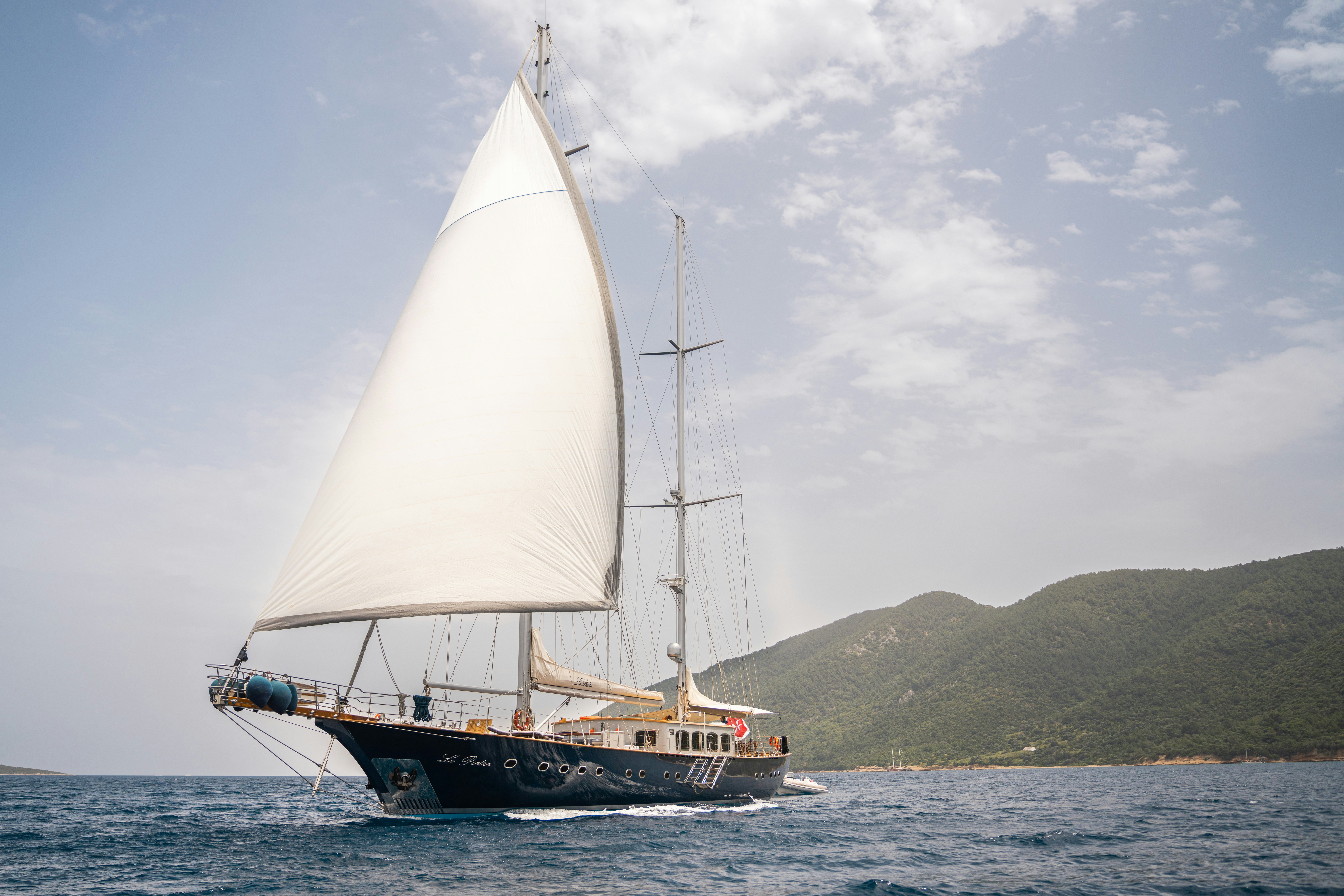 a sailboat on the water aboard LE PIETRE Yacht for Sale