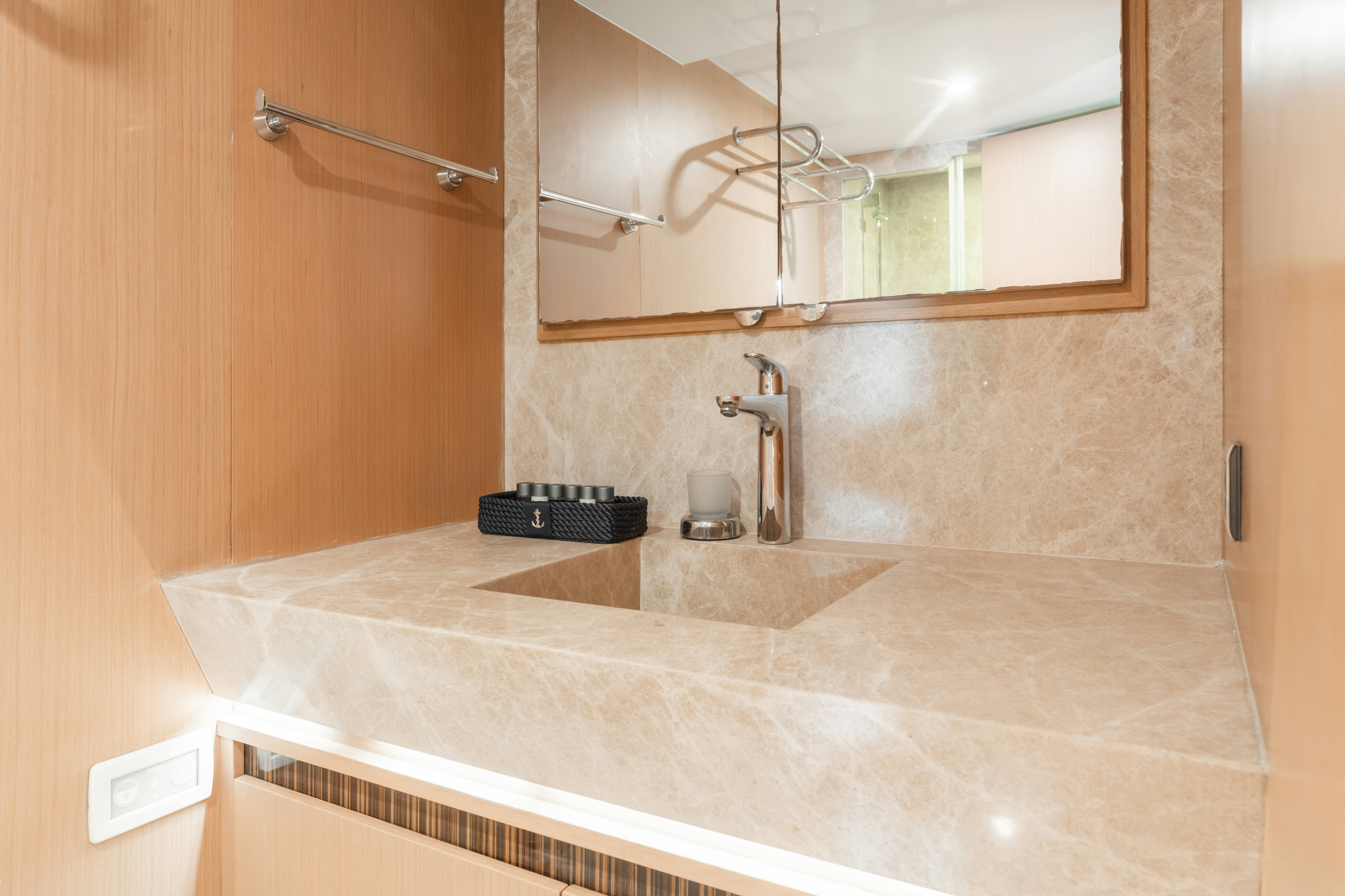 a bathroom with a large mirror aboard LE PIETRE Yacht for Sale