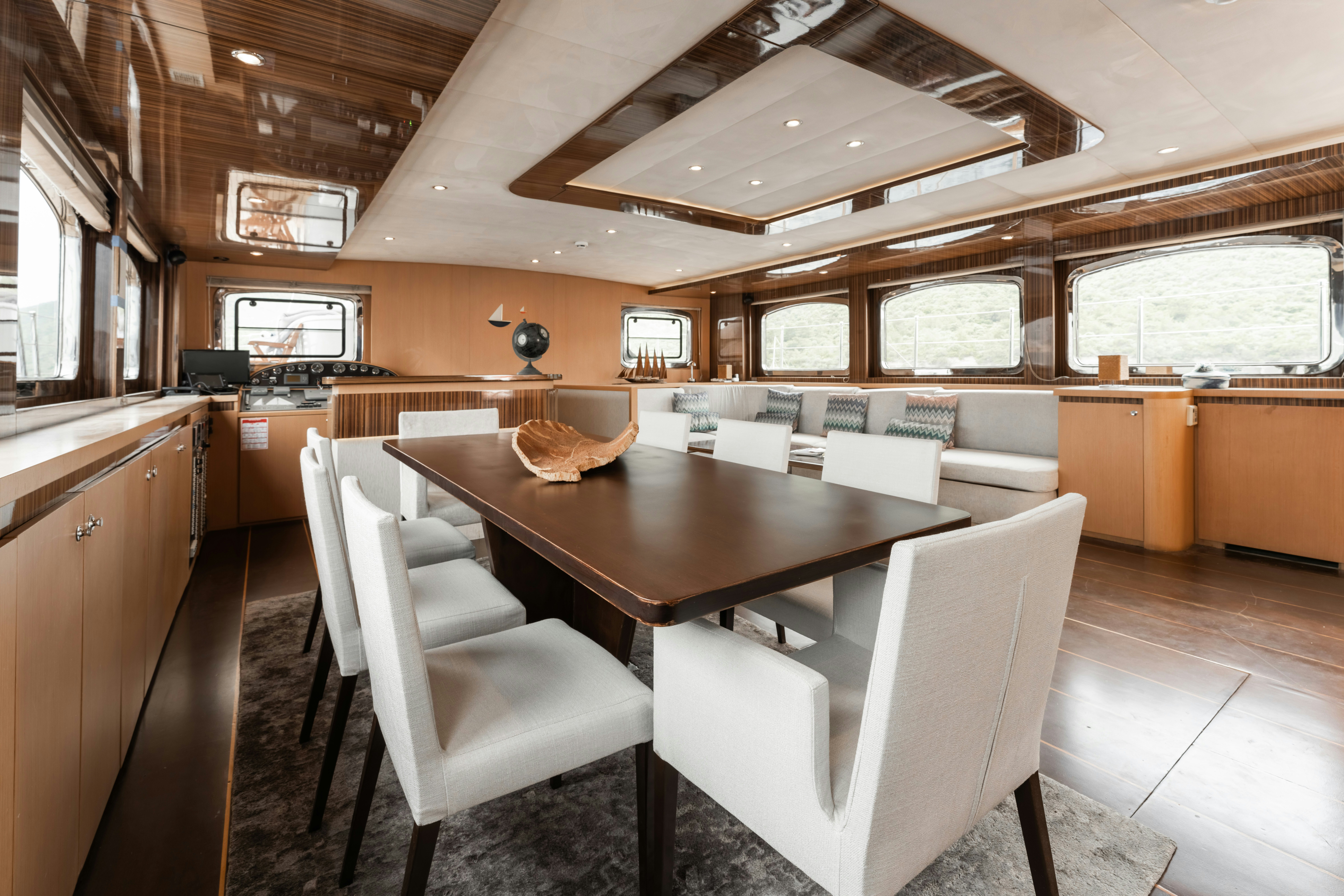 a kitchen and dining room aboard LE PIETRE Yacht for Sale