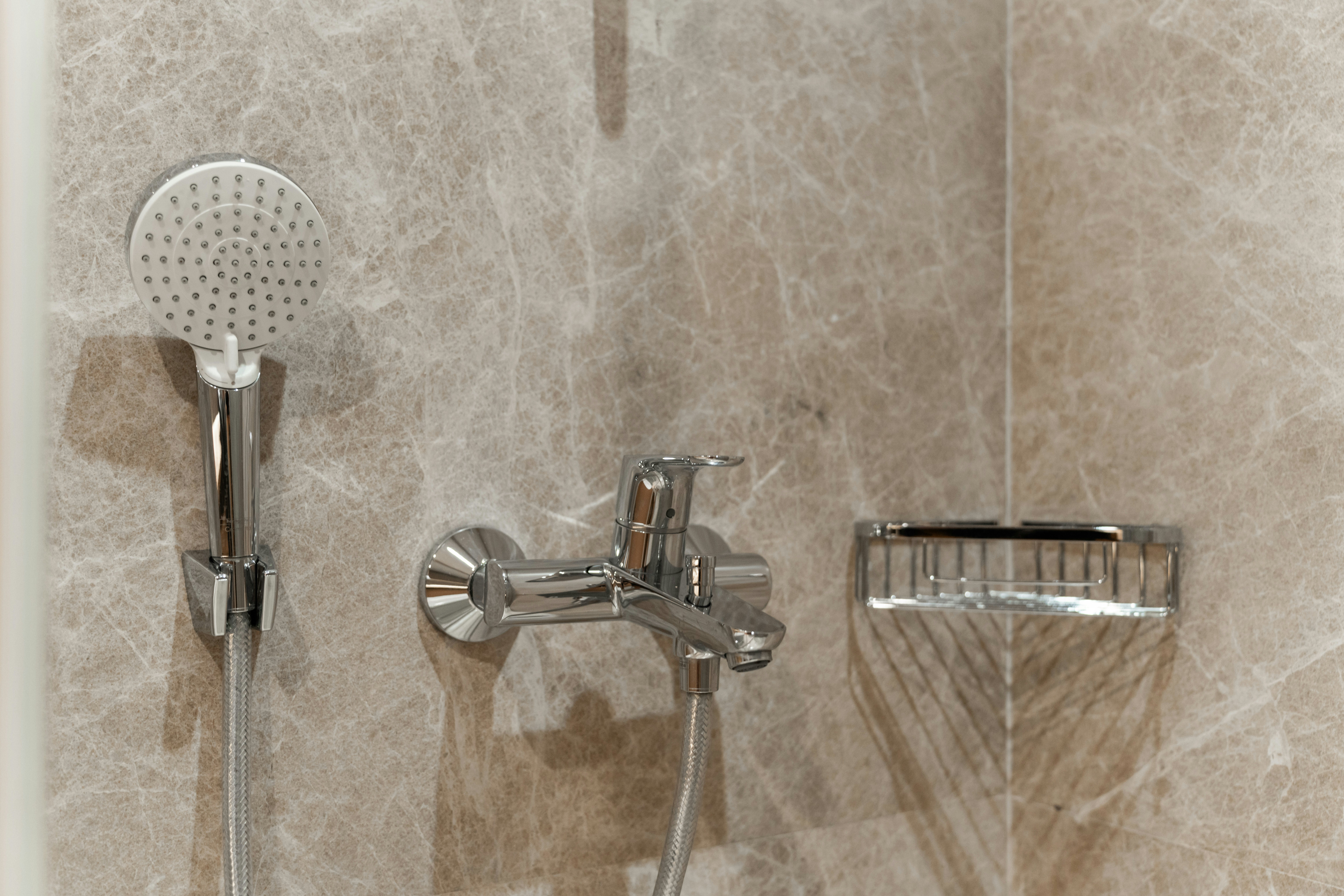 a pair of silver and metal faucets aboard LE PIETRE Yacht for Sale