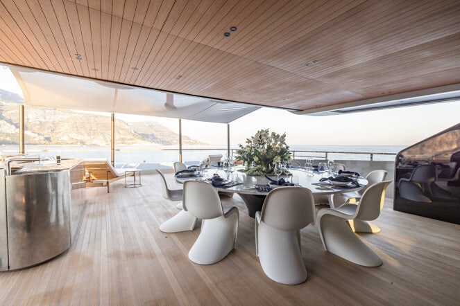 a large open space with a large open roof and a large open space aboard VIRTUOSITY Yacht for Charter