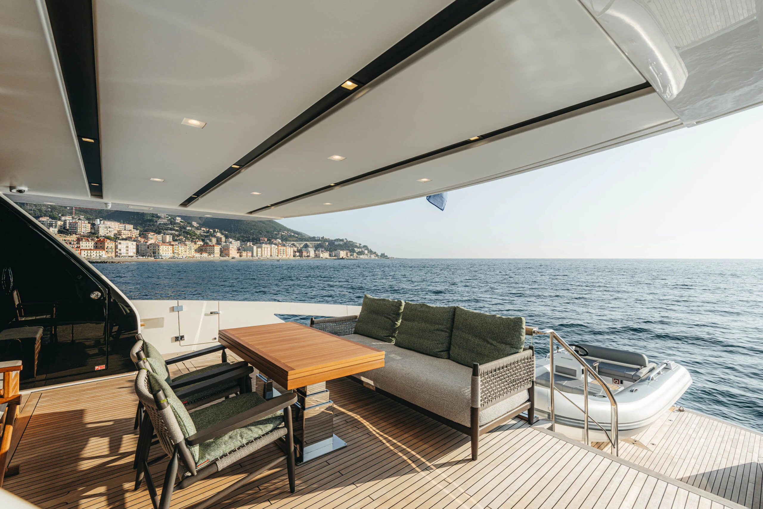 a couch and a table on a boat aboard BLUE ZONE Yacht for Sale