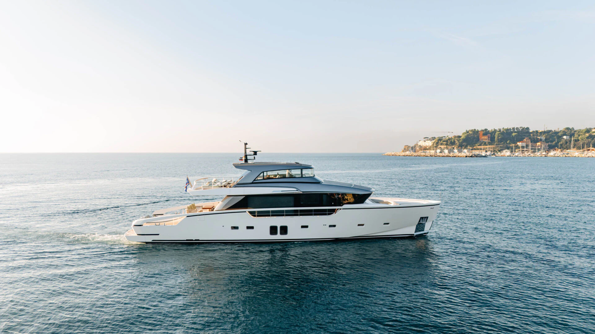 a white yacht on the water aboard BLUE ZONE Yacht for Sale