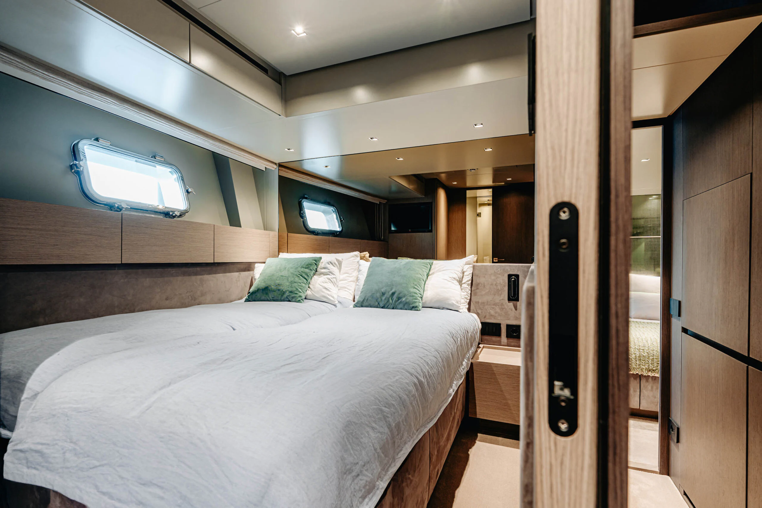 a bed in a room aboard BLUE ZONE Yacht for Sale