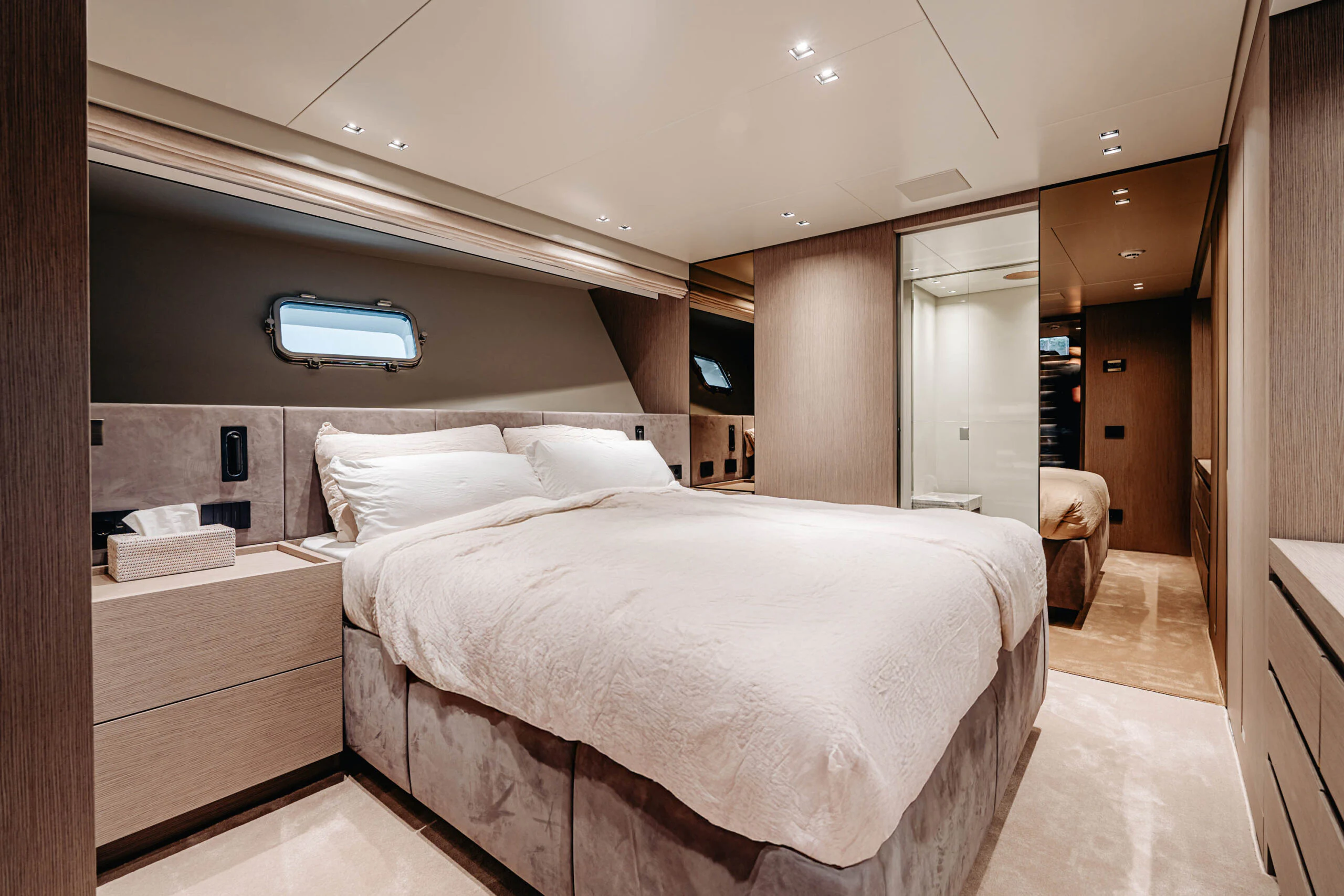 a bed in a room aboard BLUE ZONE Yacht for Sale