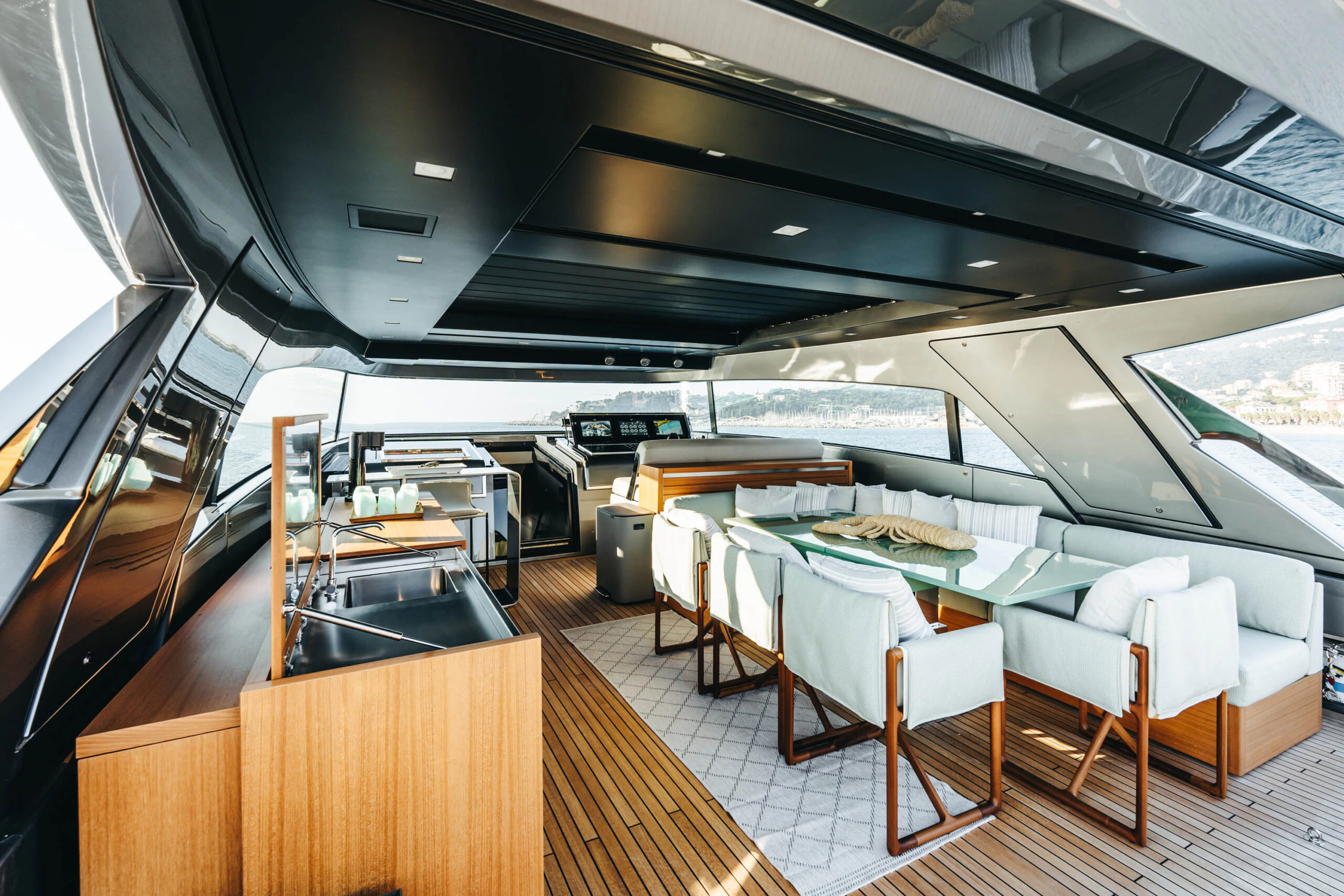 a room with a table and chairs aboard BLUE ZONE Yacht for Sale