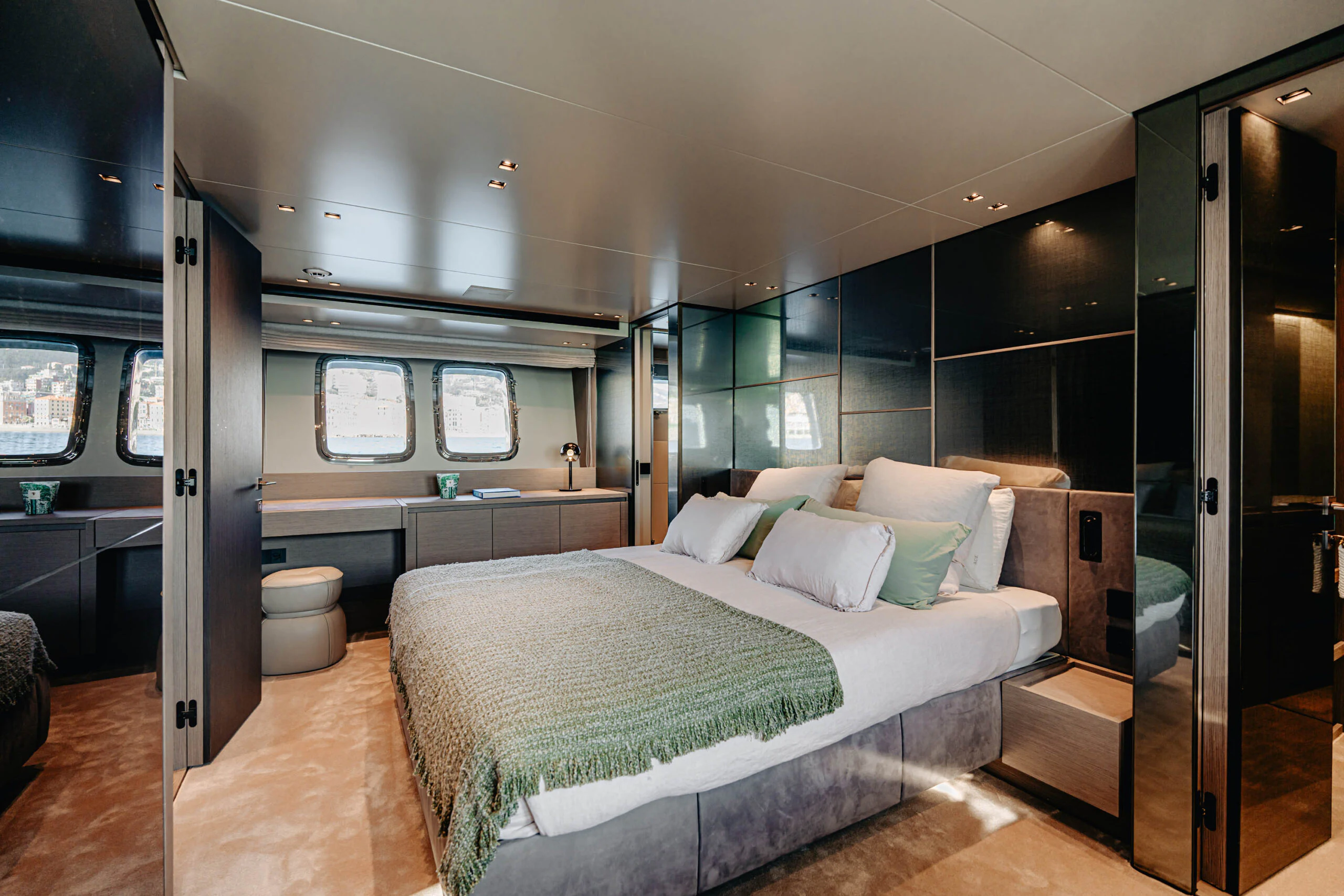 a bedroom with a bed aboard BLUE ZONE Yacht for Sale