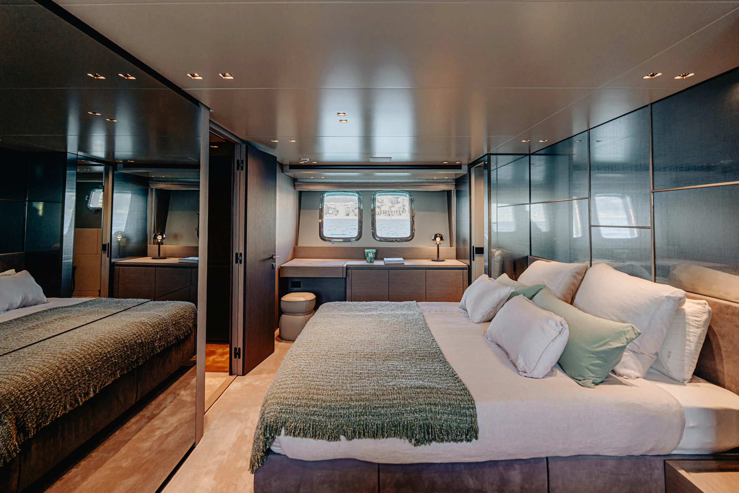 a room with two beds aboard BLUE ZONE Yacht for Sale