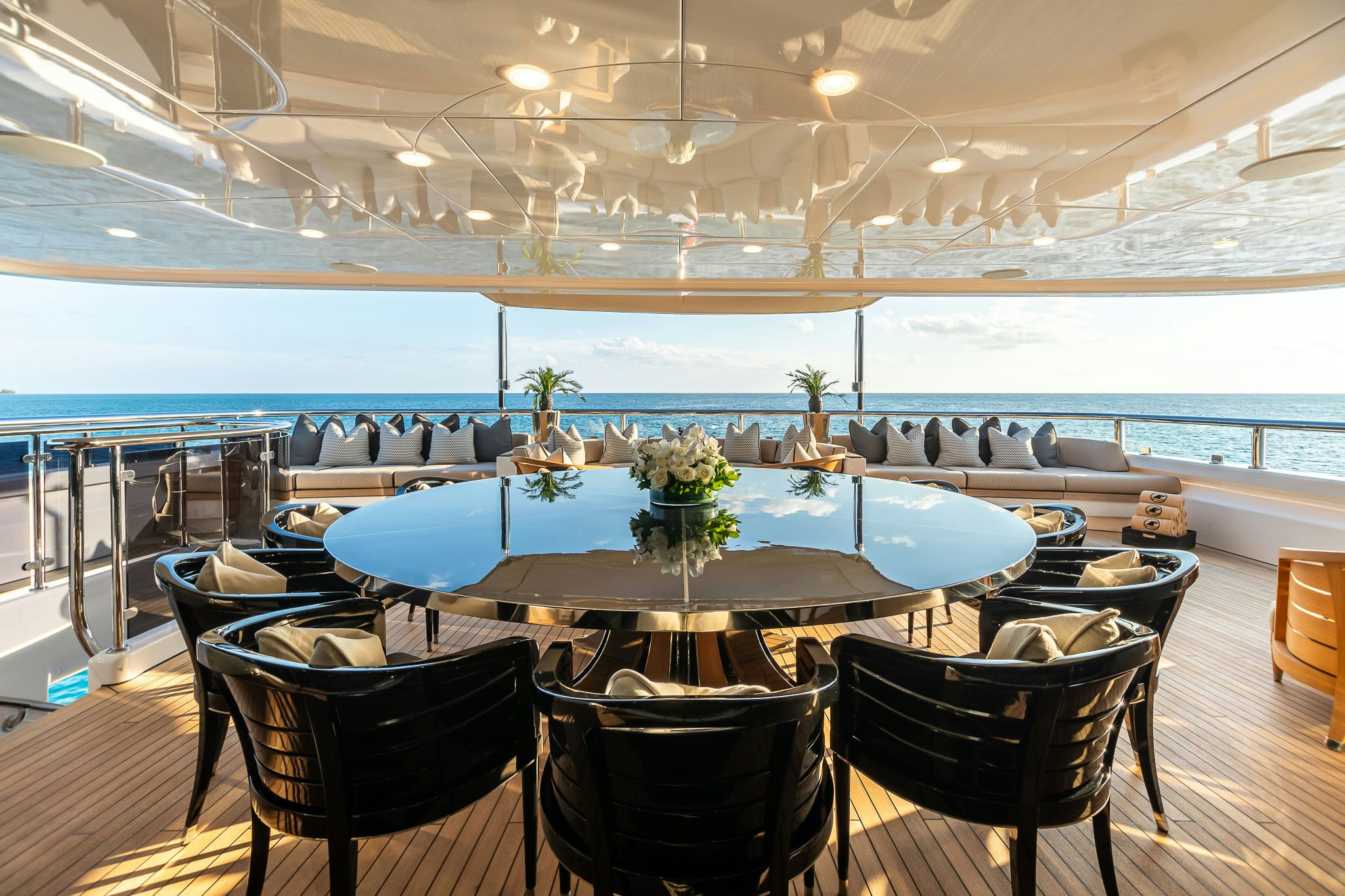 a room with a table and chairs aboard SEALION Yacht for Charter