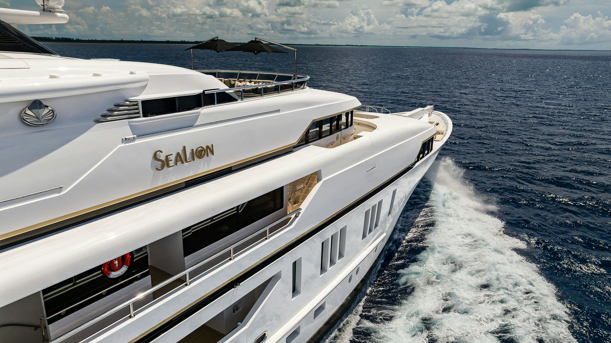 a white yacht on the water aboard SEALION Yacht for Charter