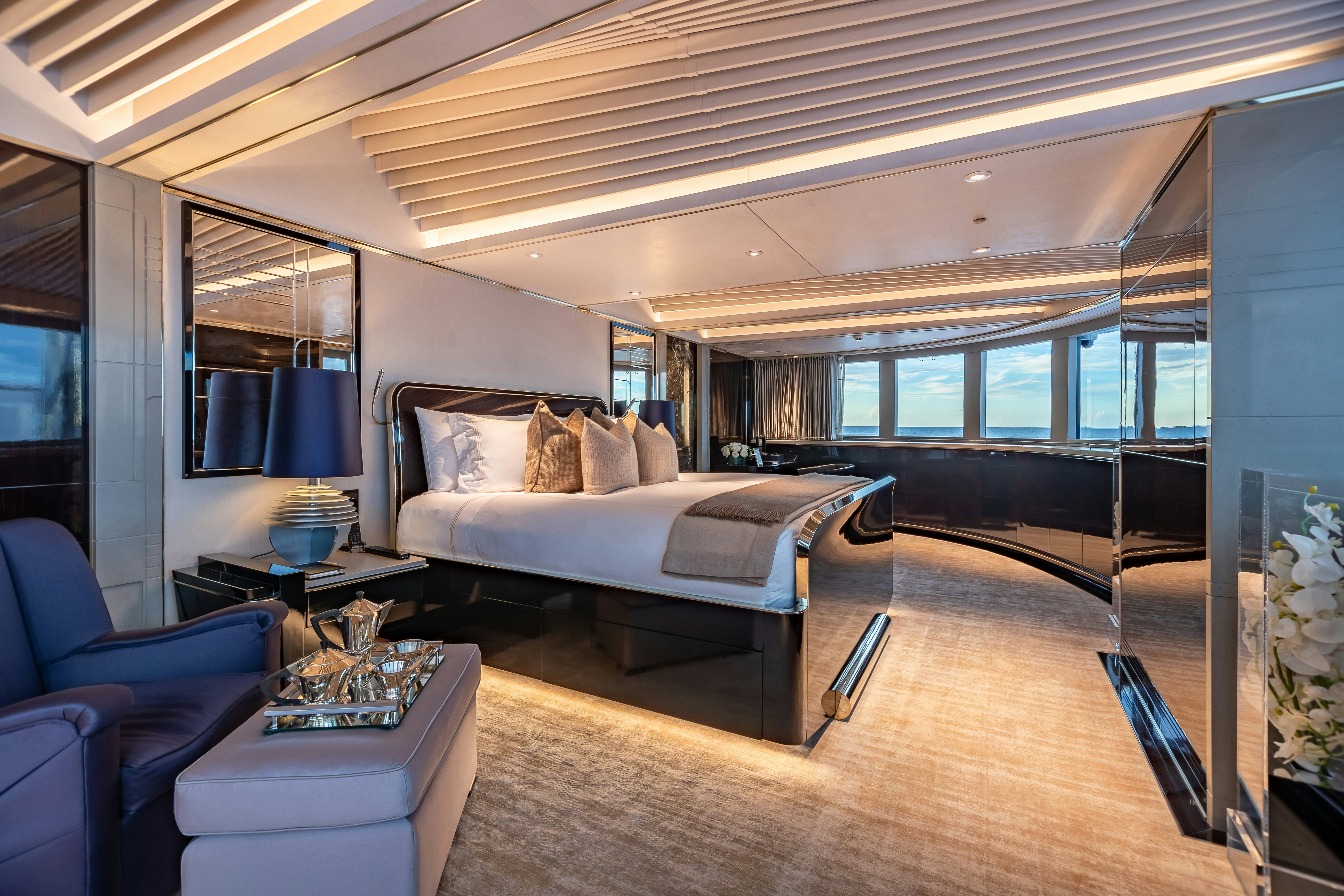 a large bedroom with a large bed aboard SEALION Yacht for Charter
