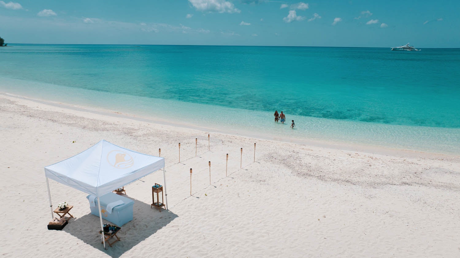 a tent on a beach aboard SEALION Yacht for Charter