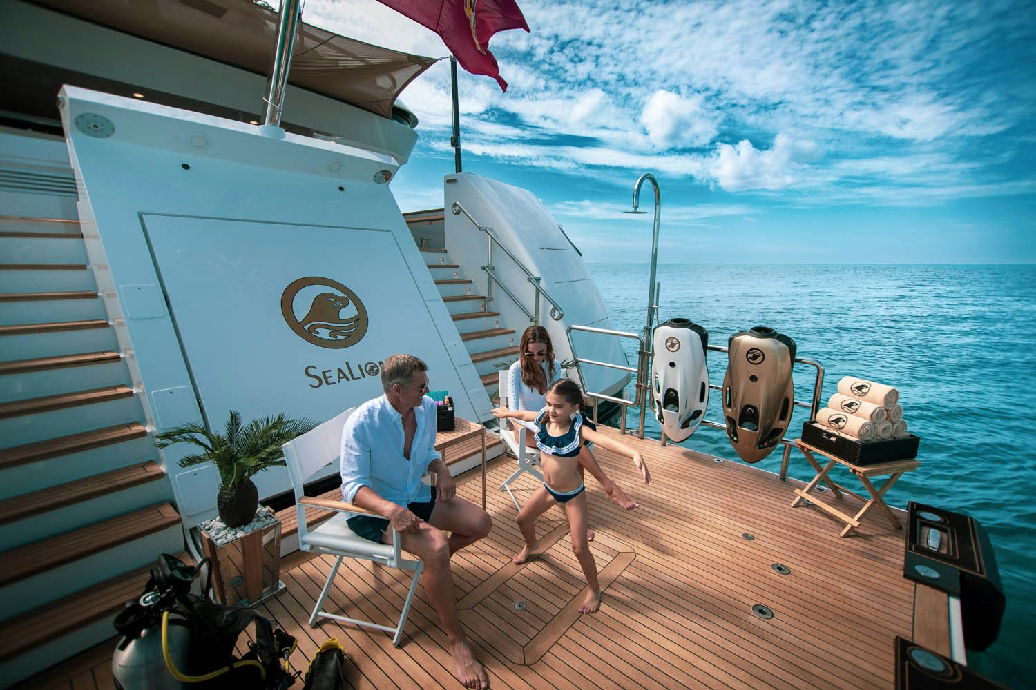 a man and woman on a boat aboard SEALION Yacht for Charter