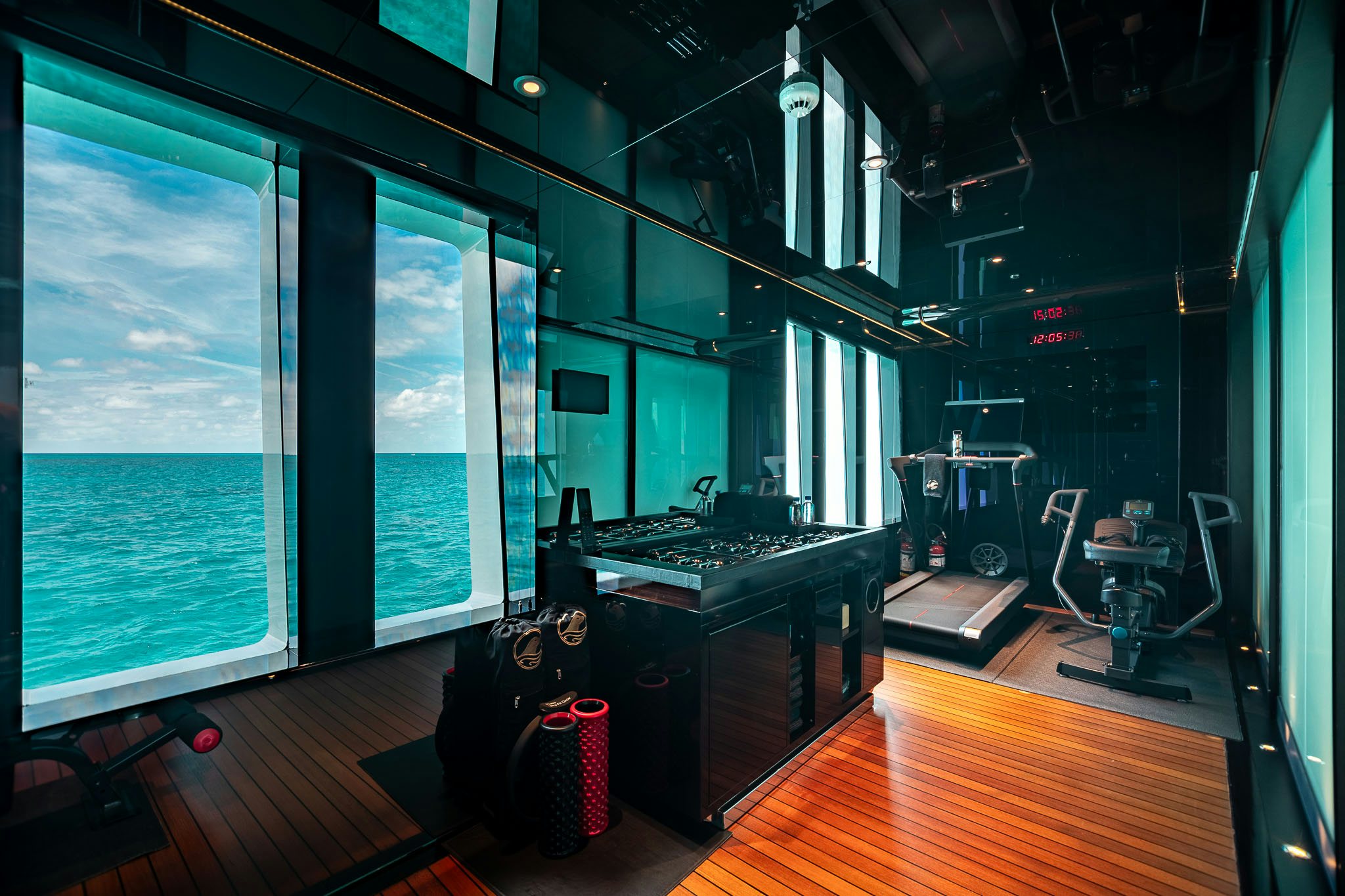 a room with a large screen aboard SEALION Yacht for Charter