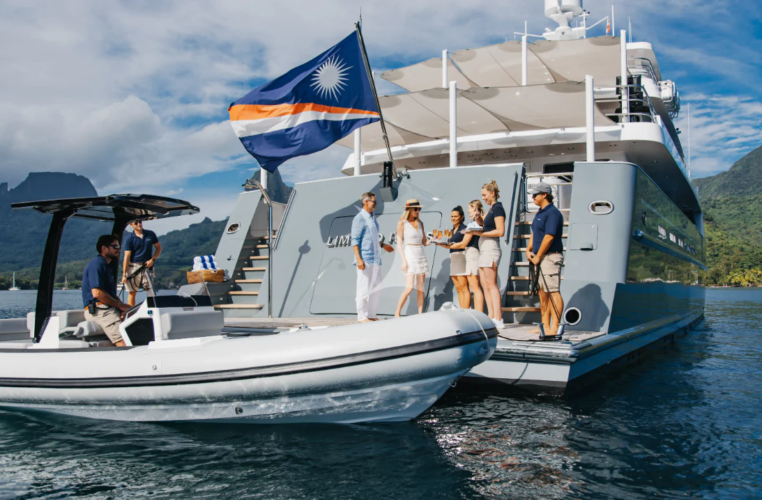 a group of people on a boat aboard LIMITED RISKS Yacht for Charter