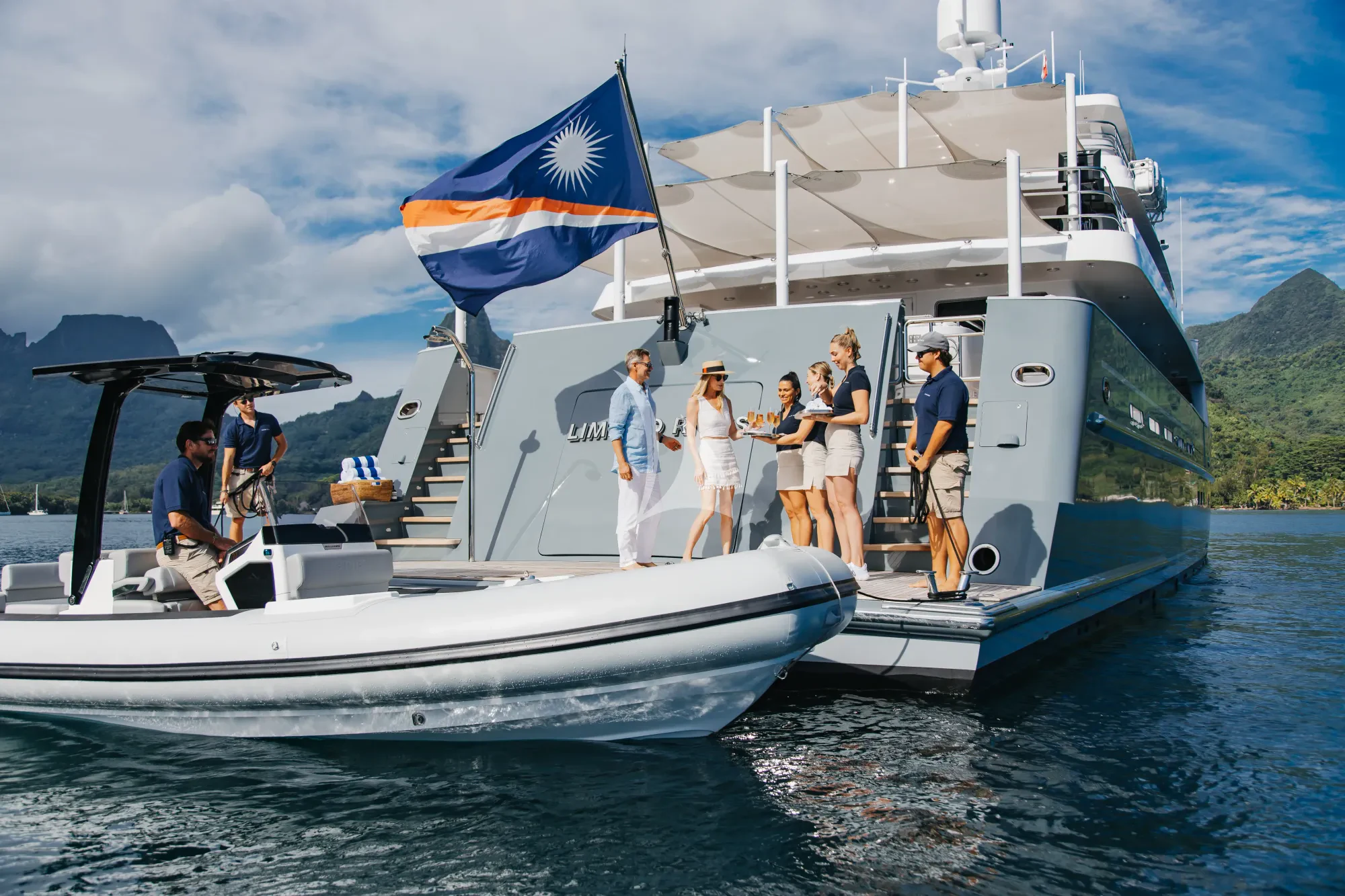 a group of people on a boat aboard LIMITED RISKS Yacht for Charter