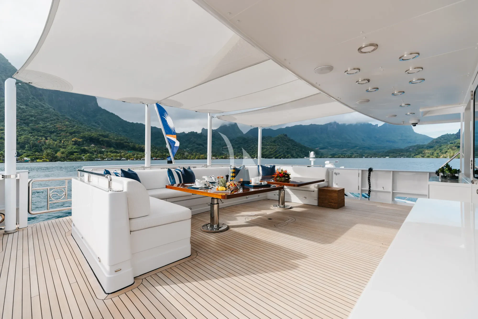 a room with a table and chairs aboard LIMITED RISKS Yacht for Charter