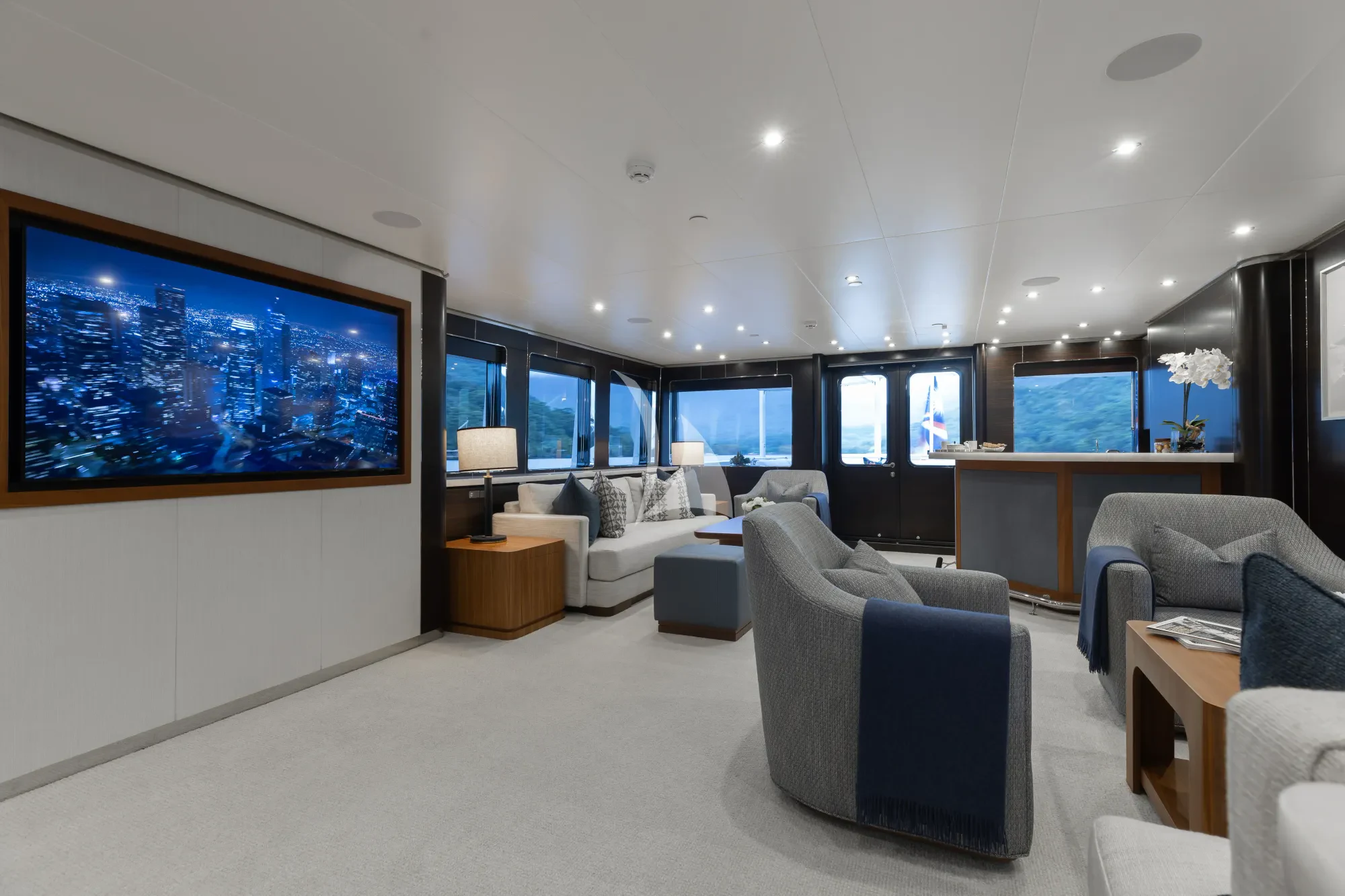 a room with a large screen aboard LIMITED RISKS Yacht for Charter