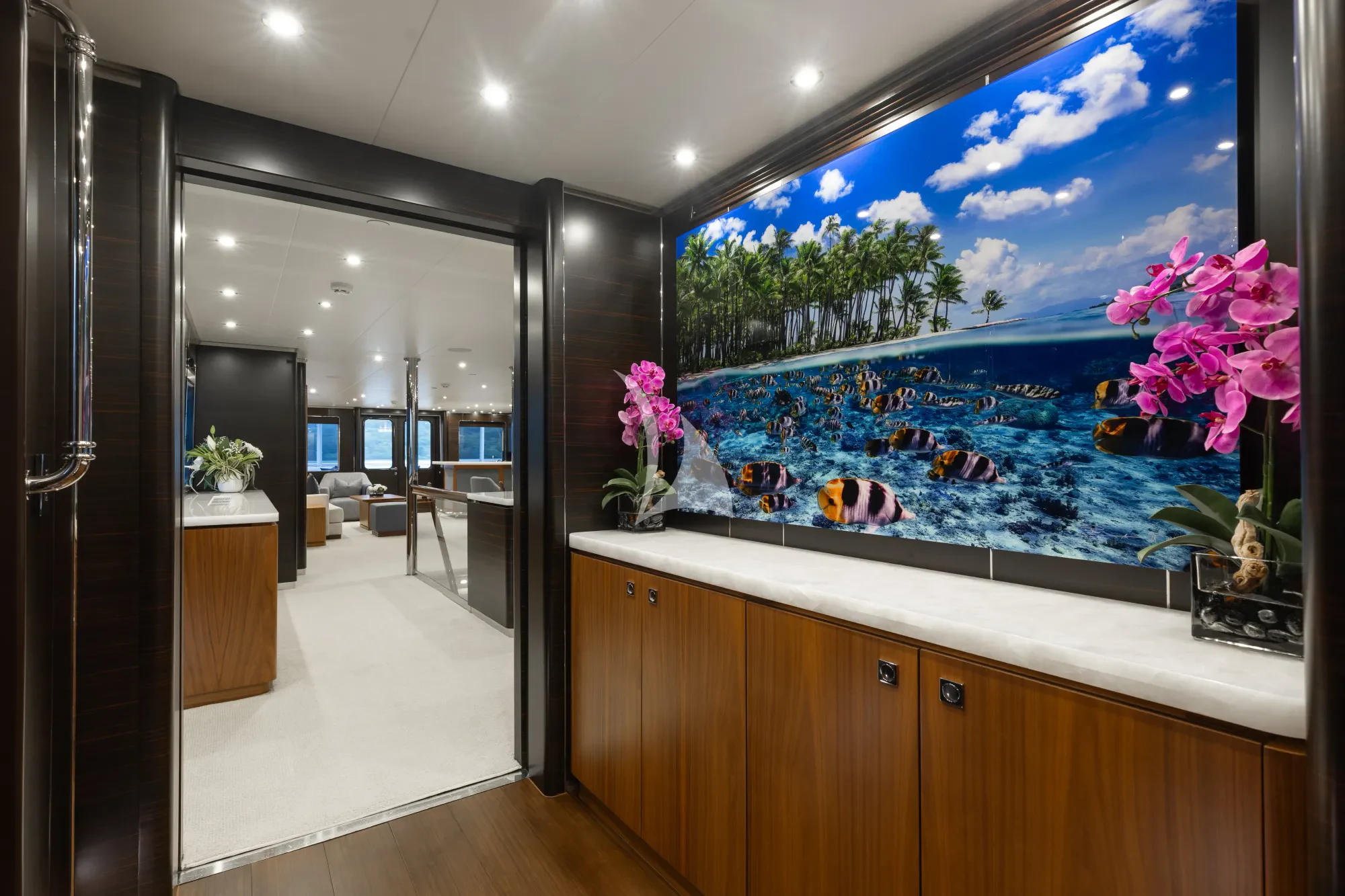 a large aquarium in a room aboard LIMITED RISKS Yacht for Charter
