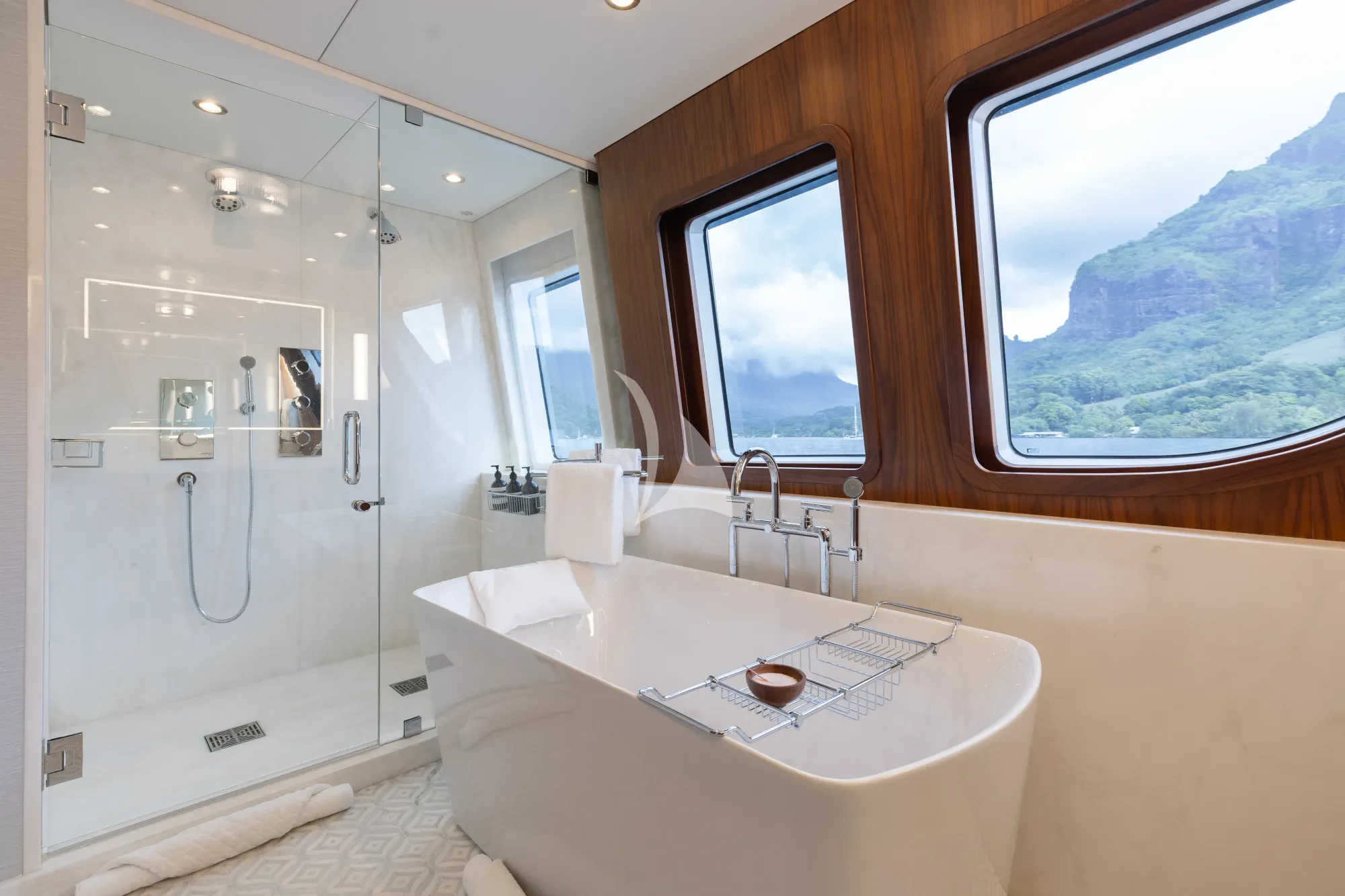 a bathroom with a large window aboard LIMITED RISKS Yacht for Charter