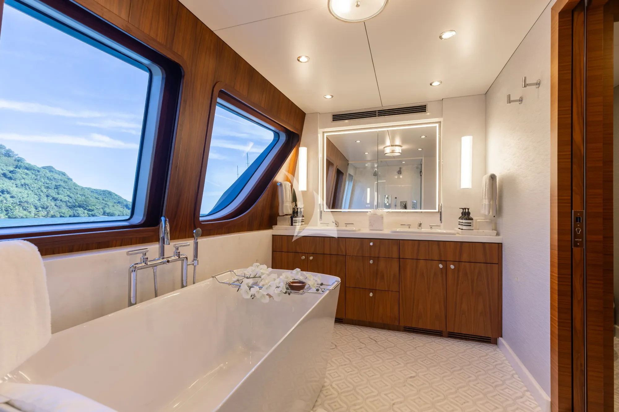 a large bathroom with a large window aboard LIMITED RISKS Yacht for Charter