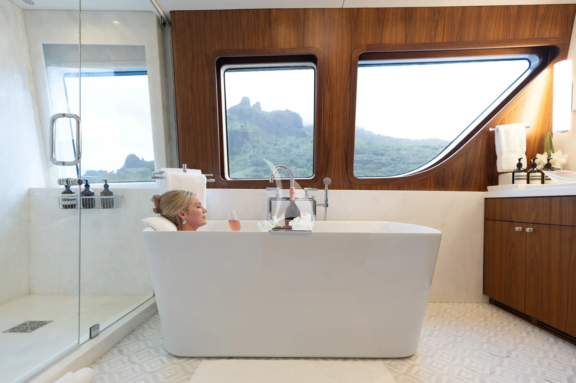 a person lying in a bathtub aboard LIMITED RISKS Yacht for Charter