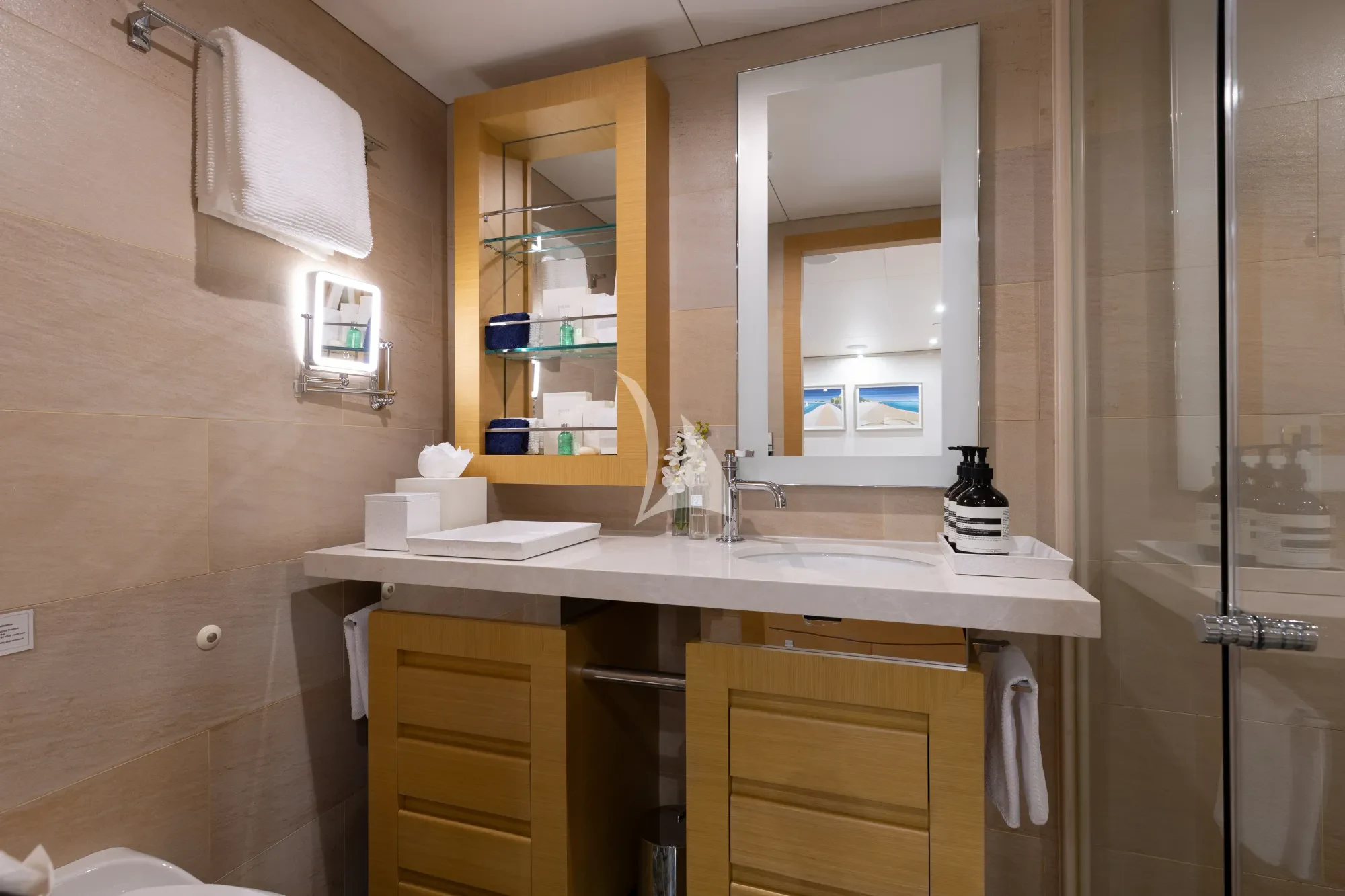 a bathroom with a sink and cabinets aboard LIMITED RISKS Yacht for Charter