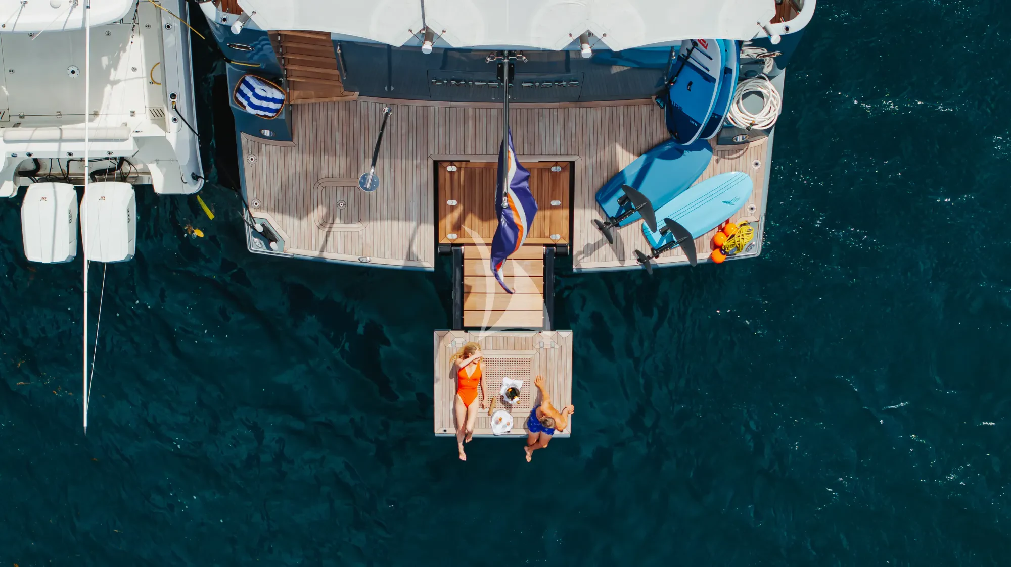 a group of people on a boat aboard LIMITED RISKS Yacht for Charter
