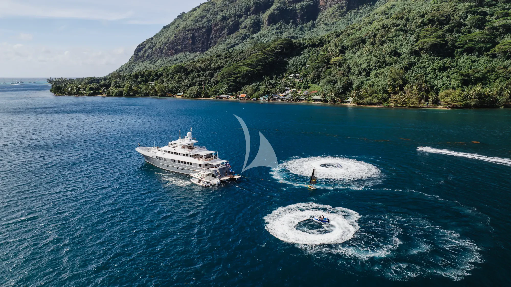 a boat sailing on the water aboard LIMITED RISKS Yacht for Charter
