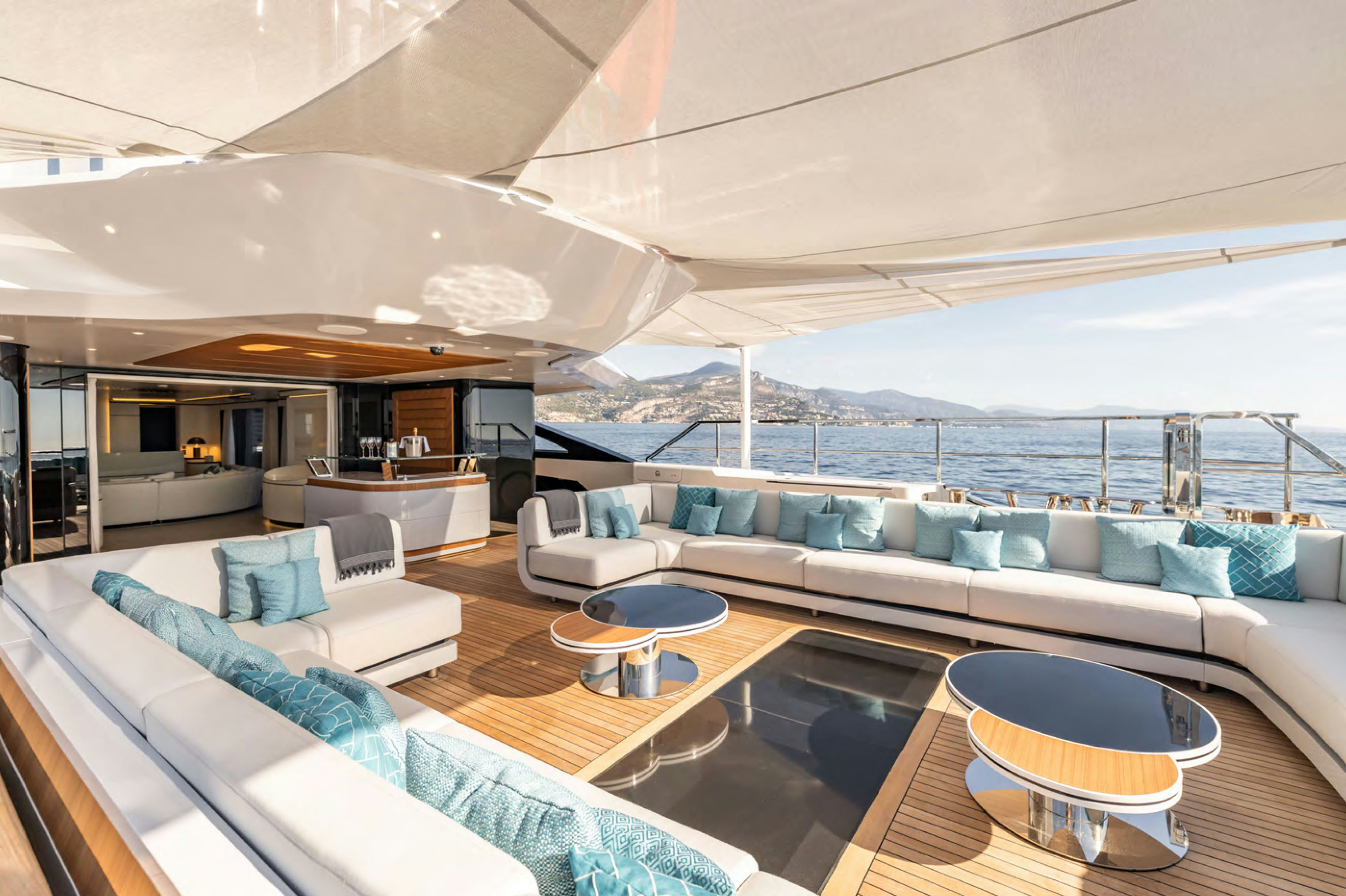a living room with a large balcony aboard FELICITA Yacht for Charter