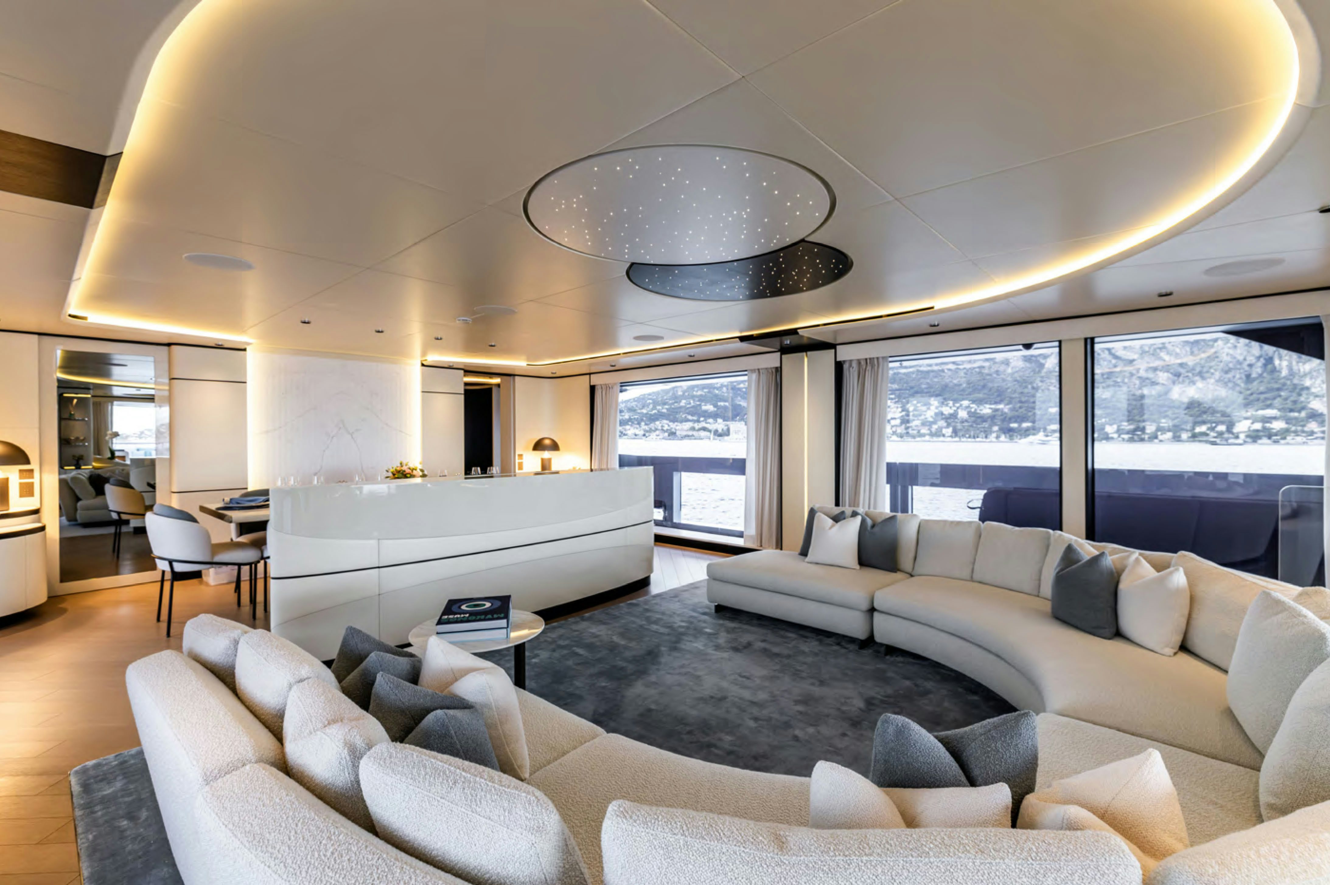 a living room with a large window aboard FELICITA Yacht for Charter