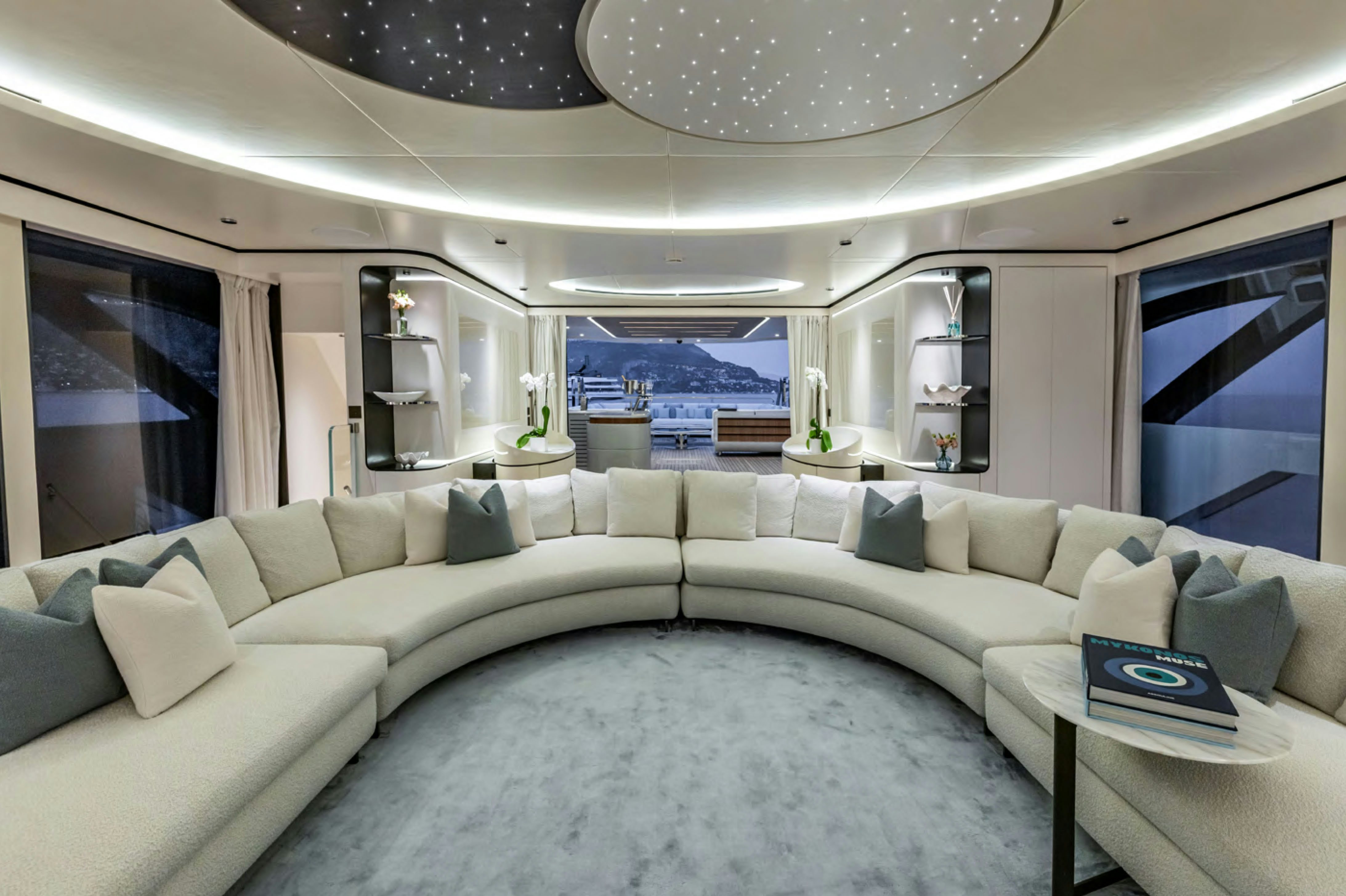 a large white couch in a room aboard FELICITA Yacht for Charter