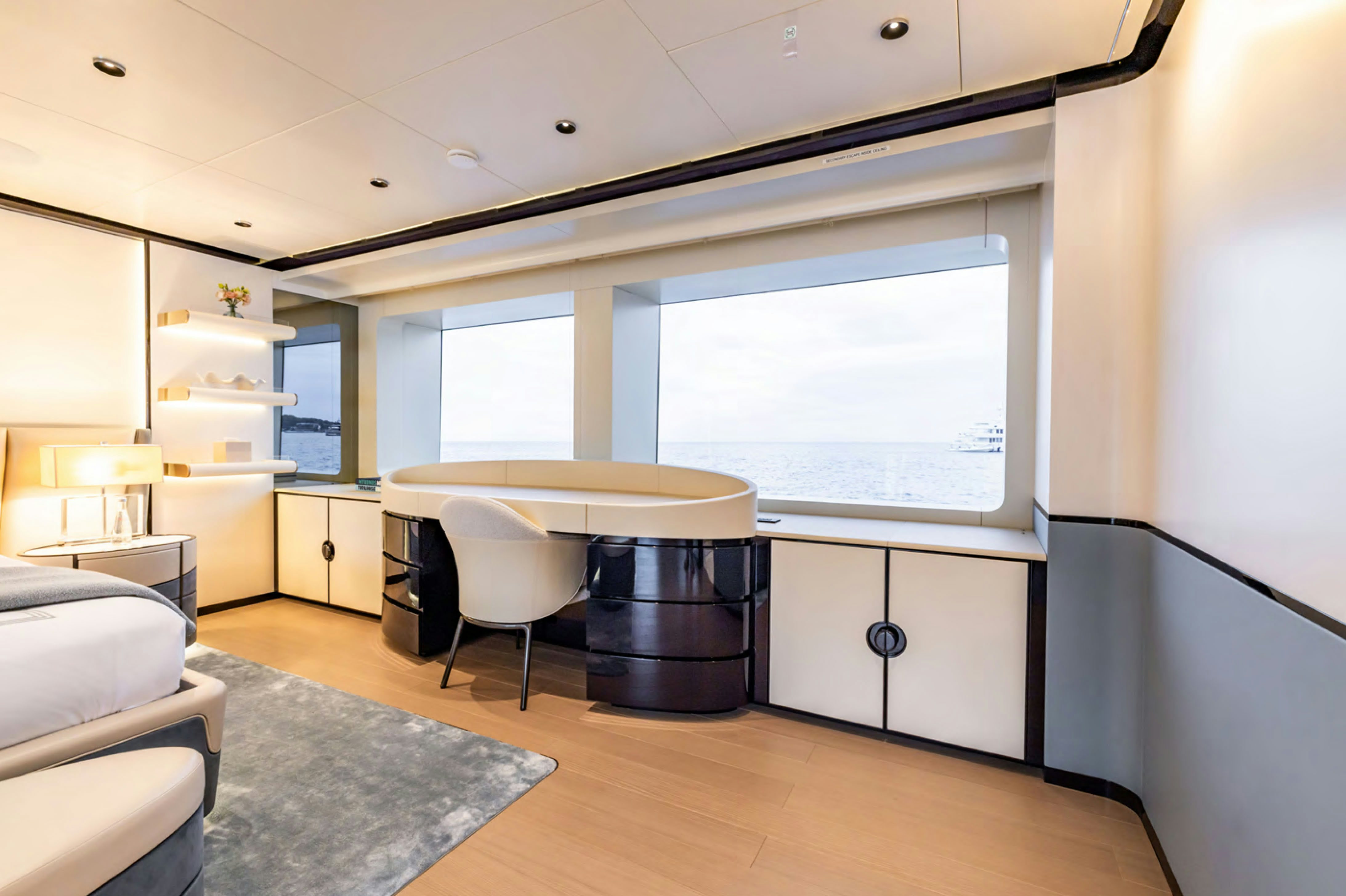 a room with a table and a window aboard FELICITA Yacht for Charter