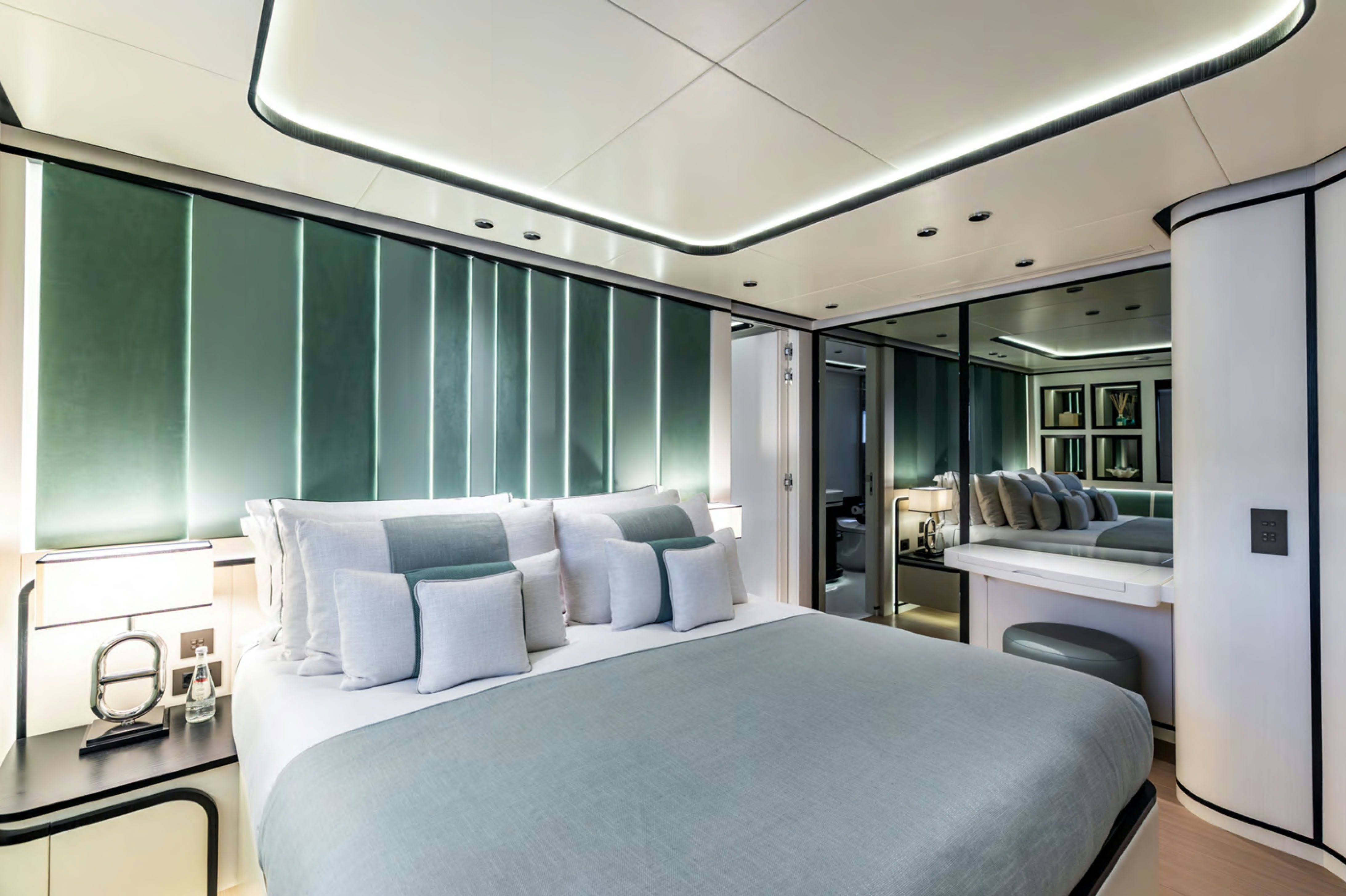 a room with a bed and a large window aboard FELICITA Yacht for Charter
