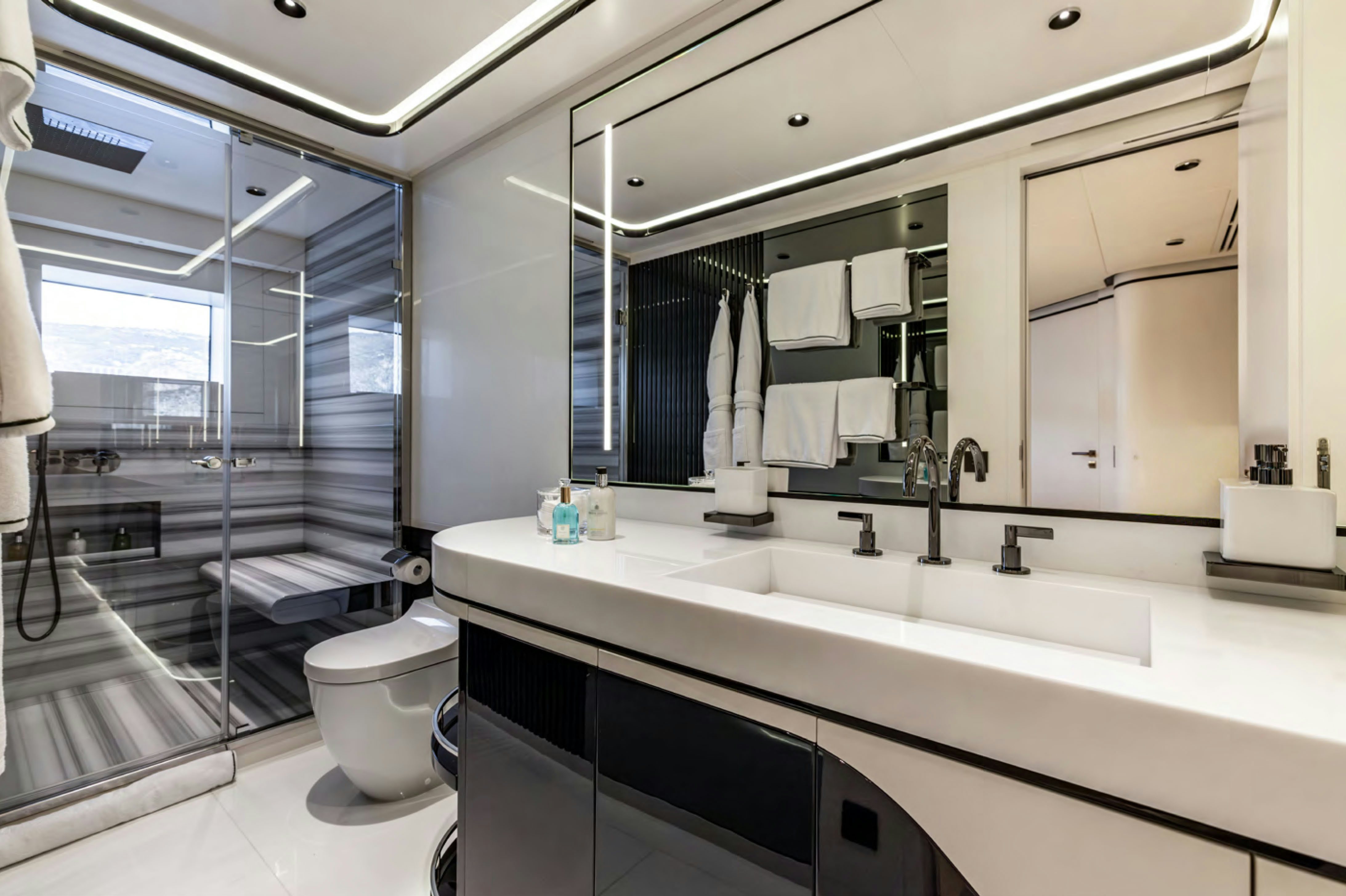 a bathroom with a glass shower aboard FELICITA Yacht for Charter