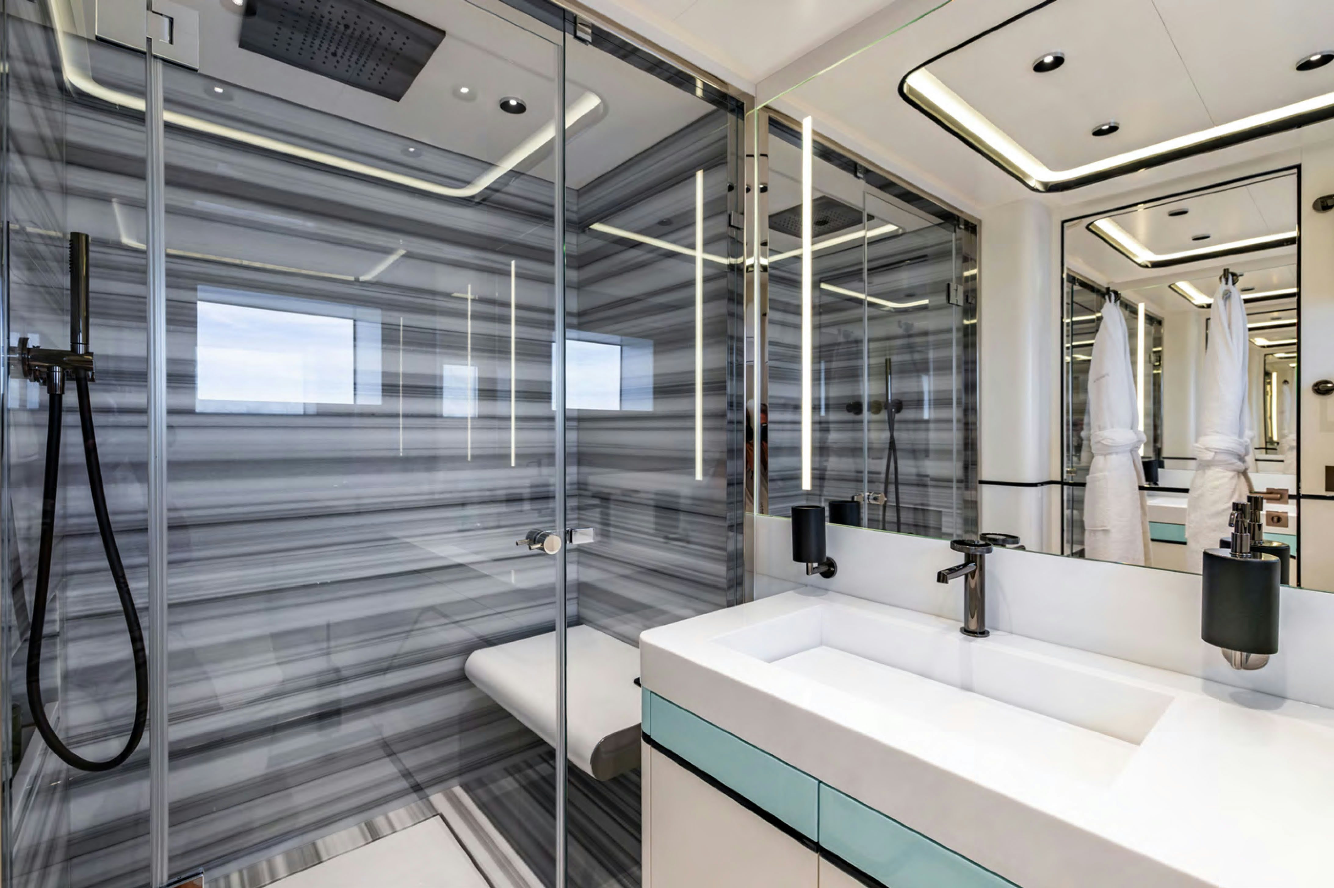 a bathroom with a glass shower aboard FELICITA Yacht for Charter