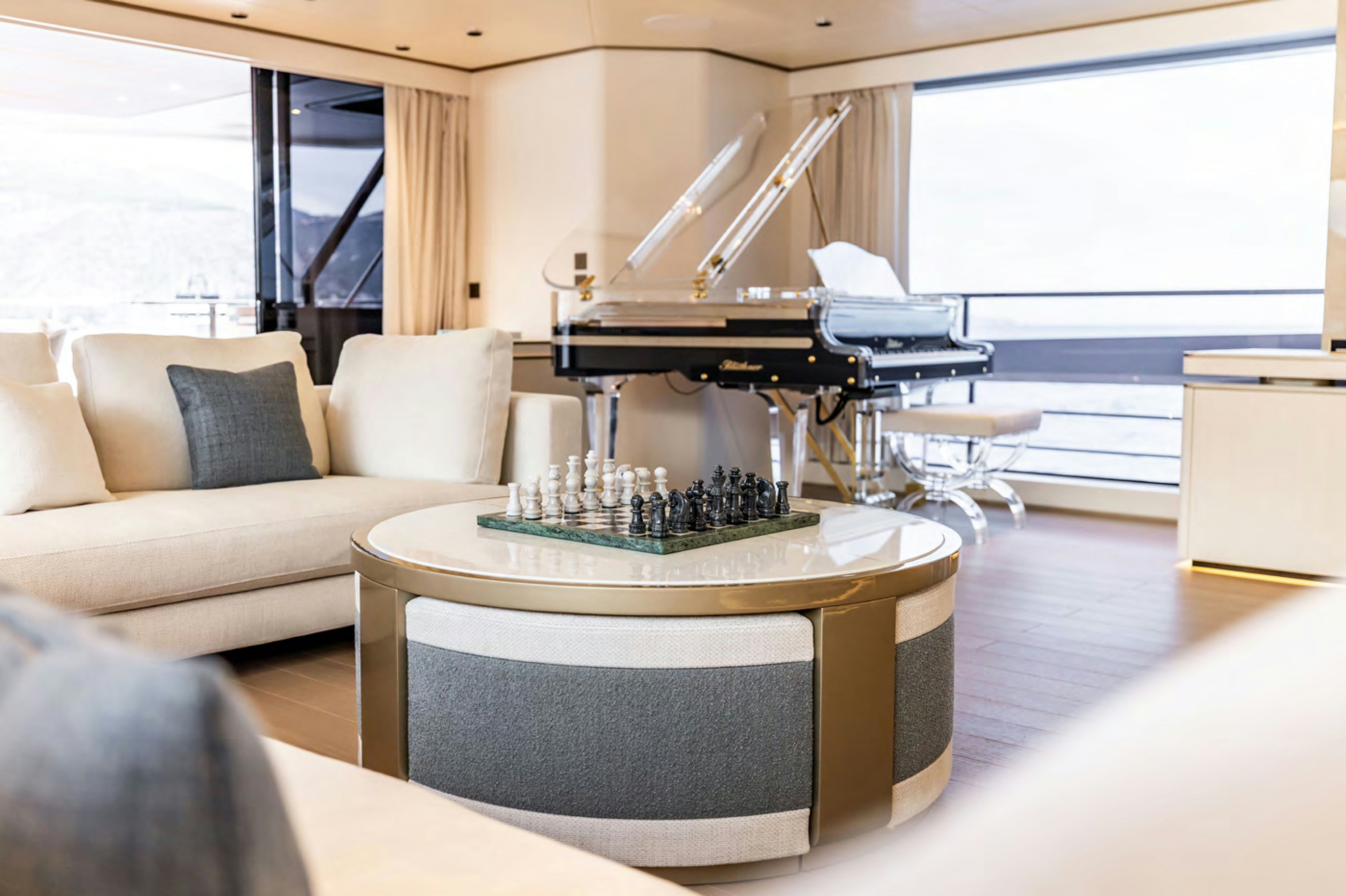 a piano in a living room aboard FELICITA Yacht for Charter