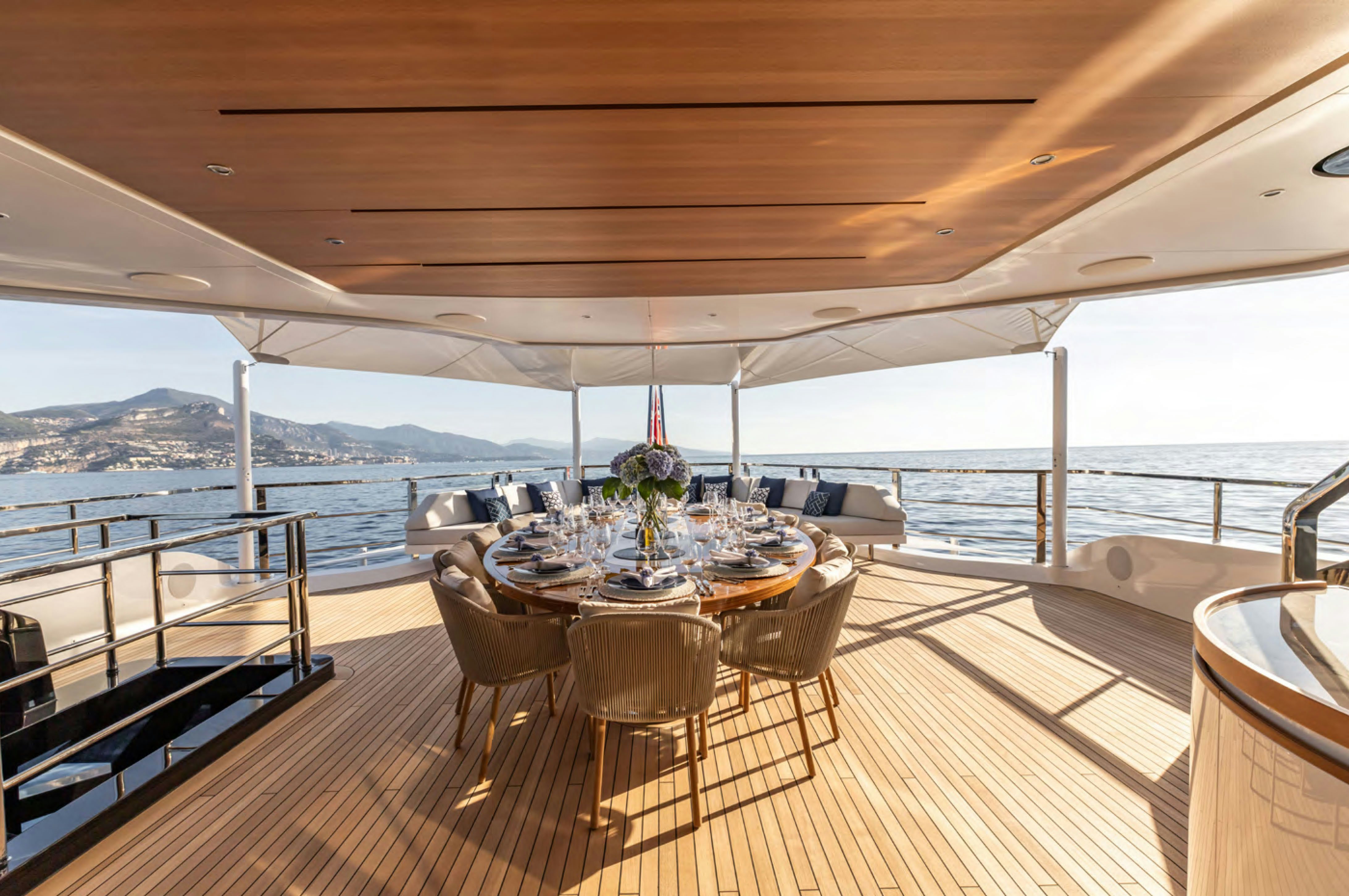a table on a deck aboard FELICITA Yacht for Charter