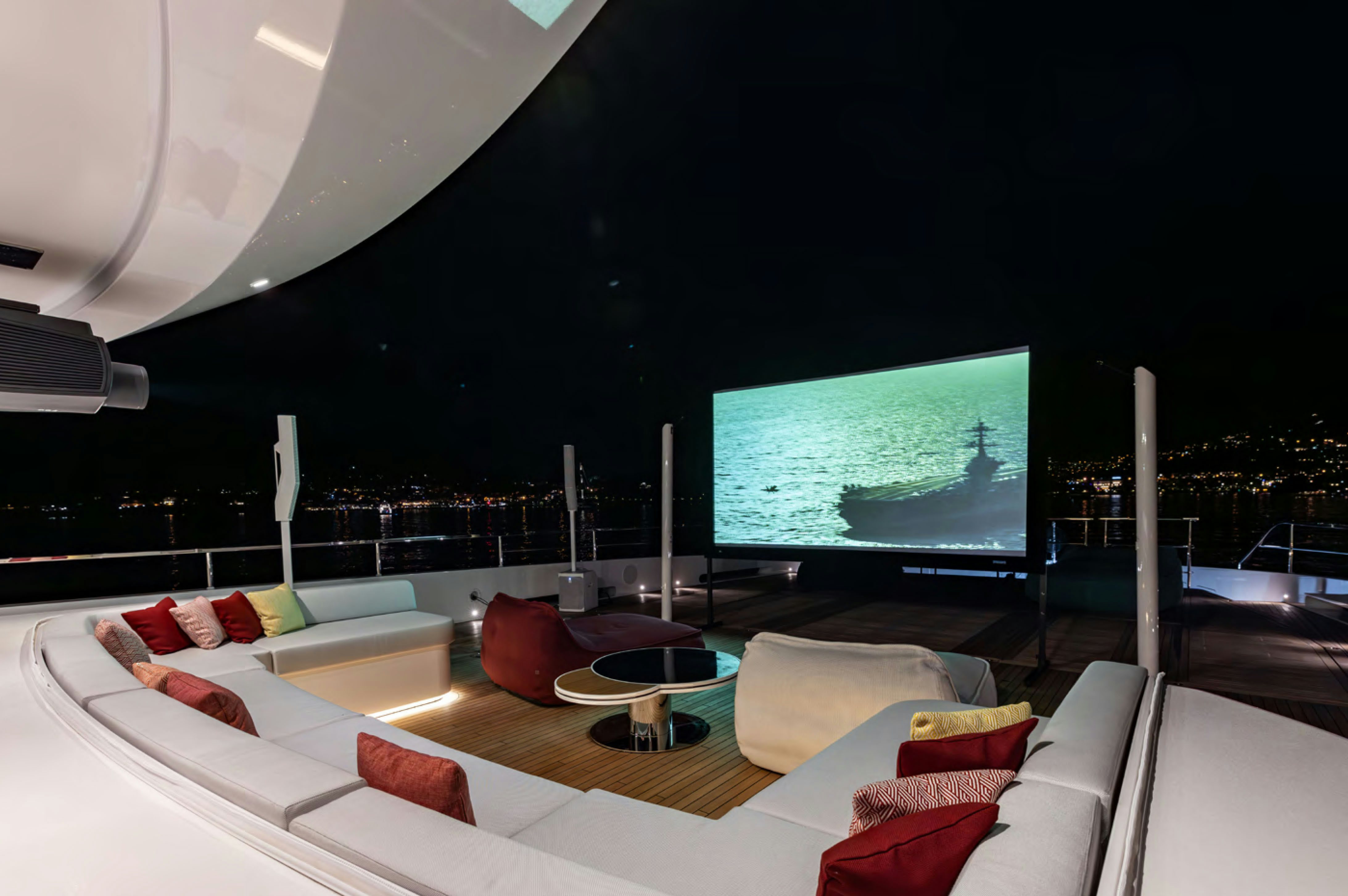 a living room with a large screen aboard FELICITA Yacht for Charter